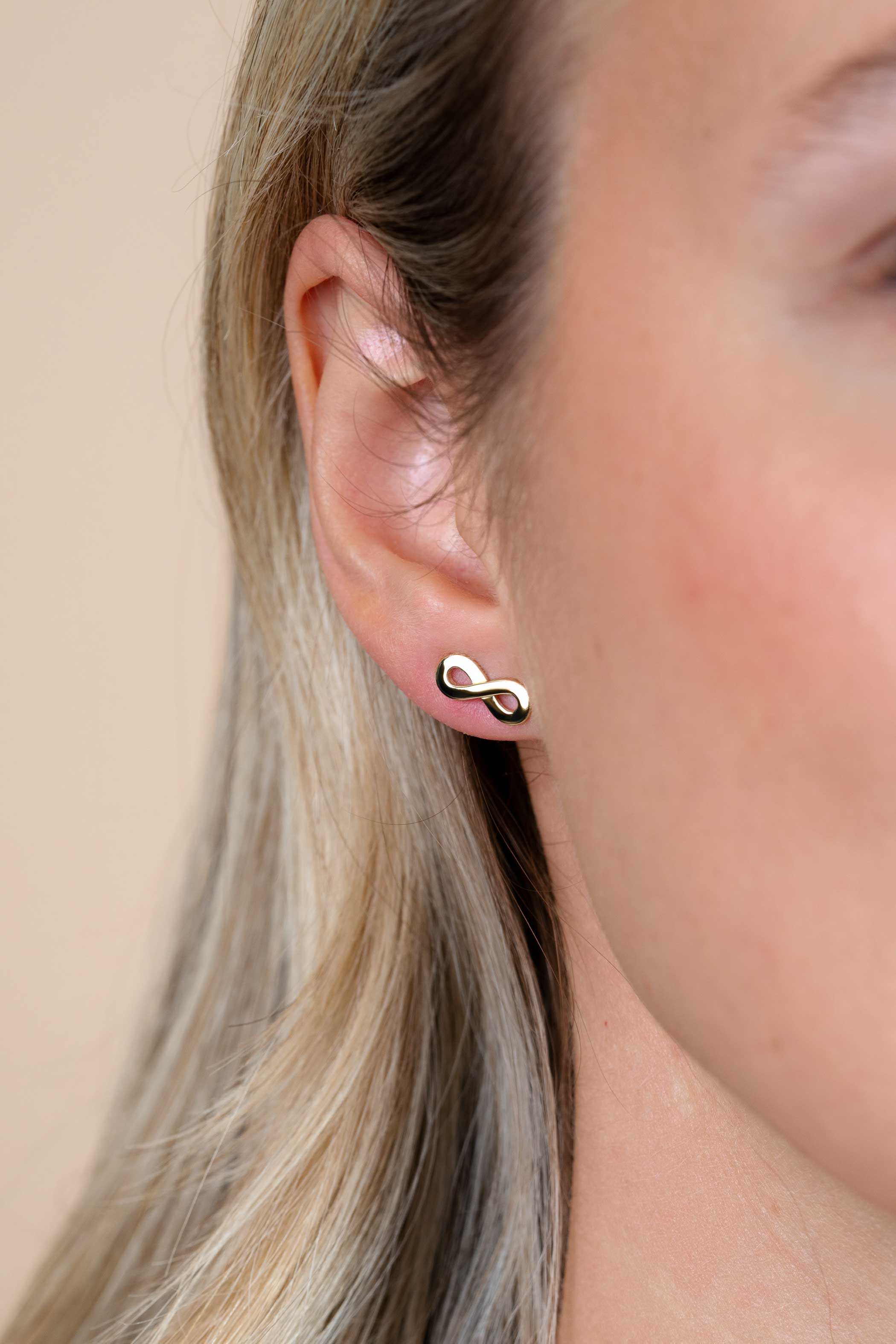 ZINZI silberne gelbvergoldete Ohrstecker infinity ZIO1065G