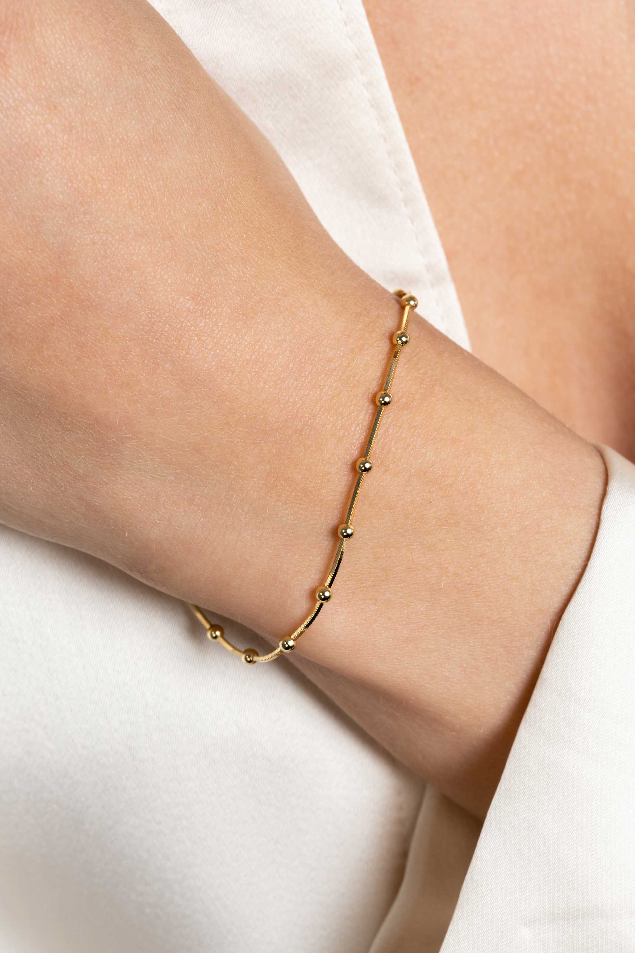 ZINZI zlv. gg.verg.slangenarmband met bolletjes