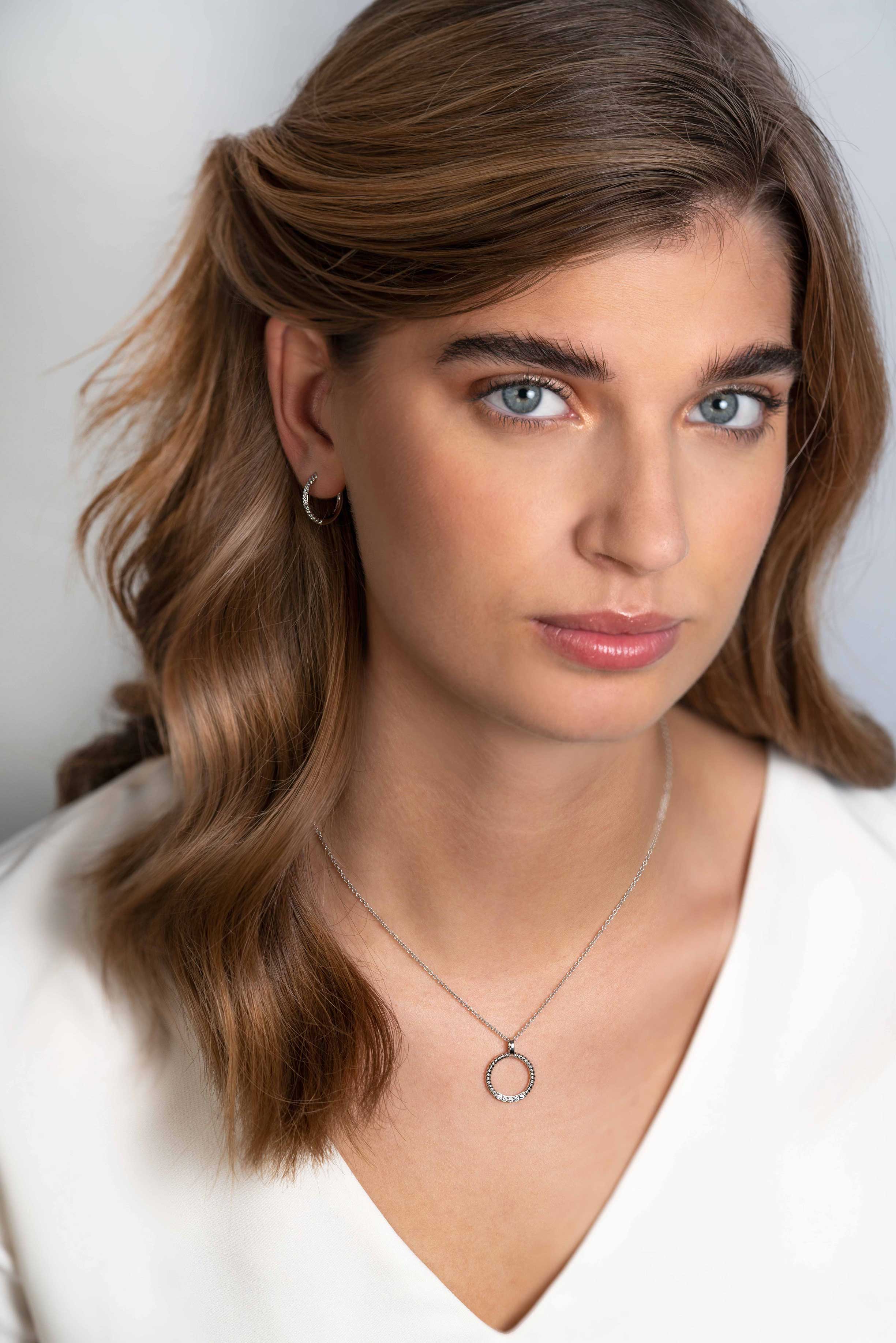 ZINZI silberner runder Anhänger 22mm gedreht weißer Zirkonia ZIH2128