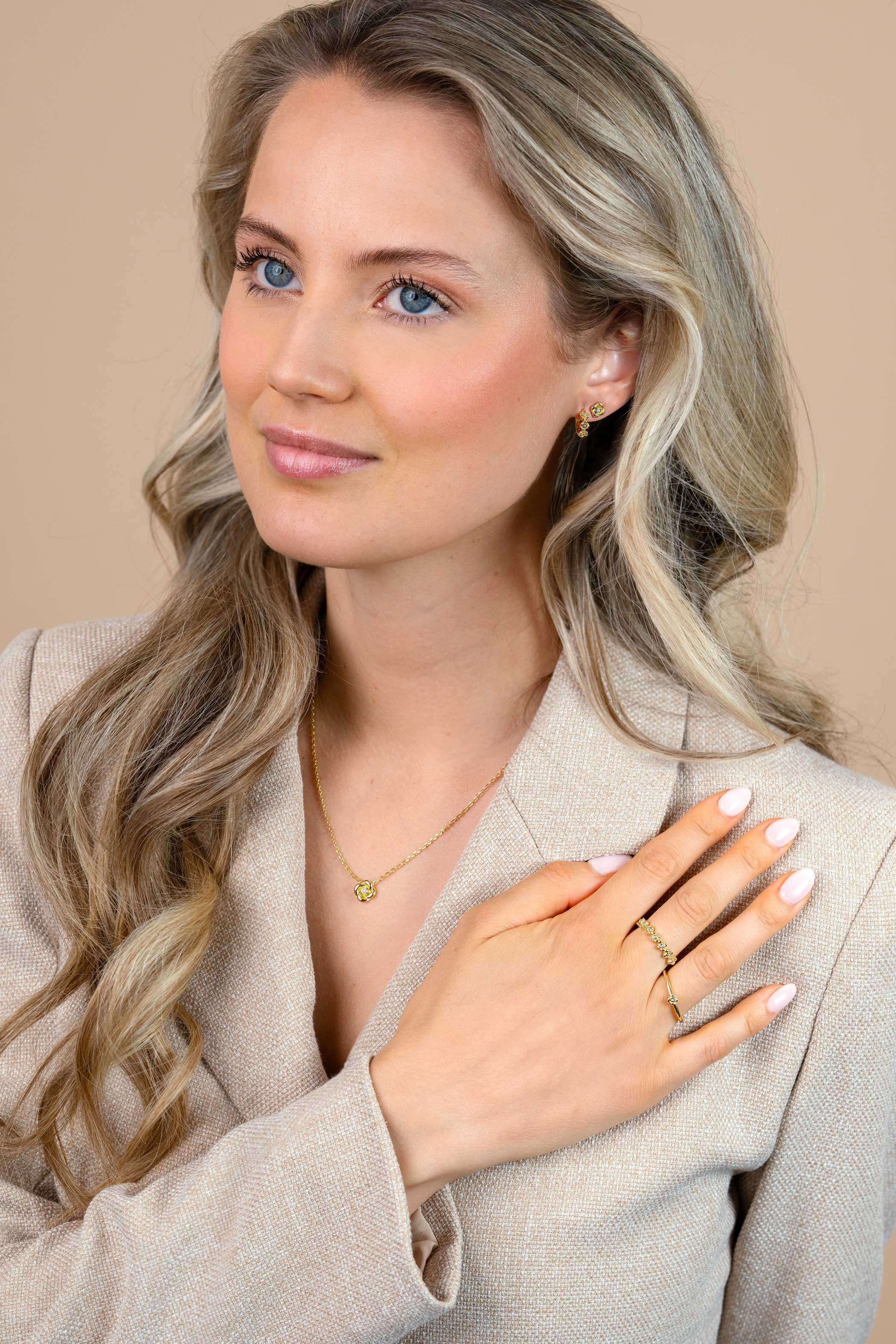 ZINZI zlv. ring gg.verg. 7 roosjes en zirconia's mt.62