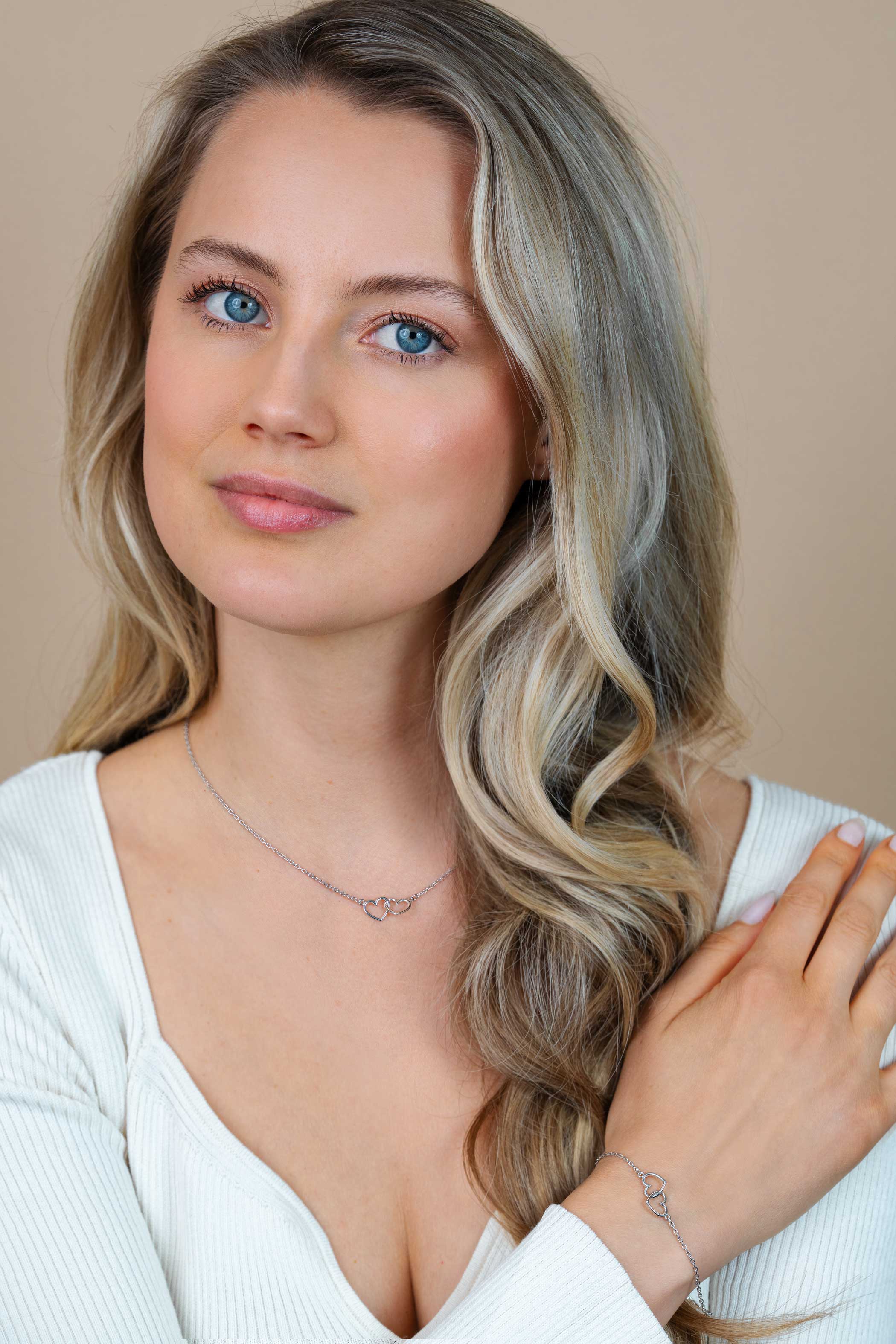ZINZI zlv. armband twee hartjes in elkaar