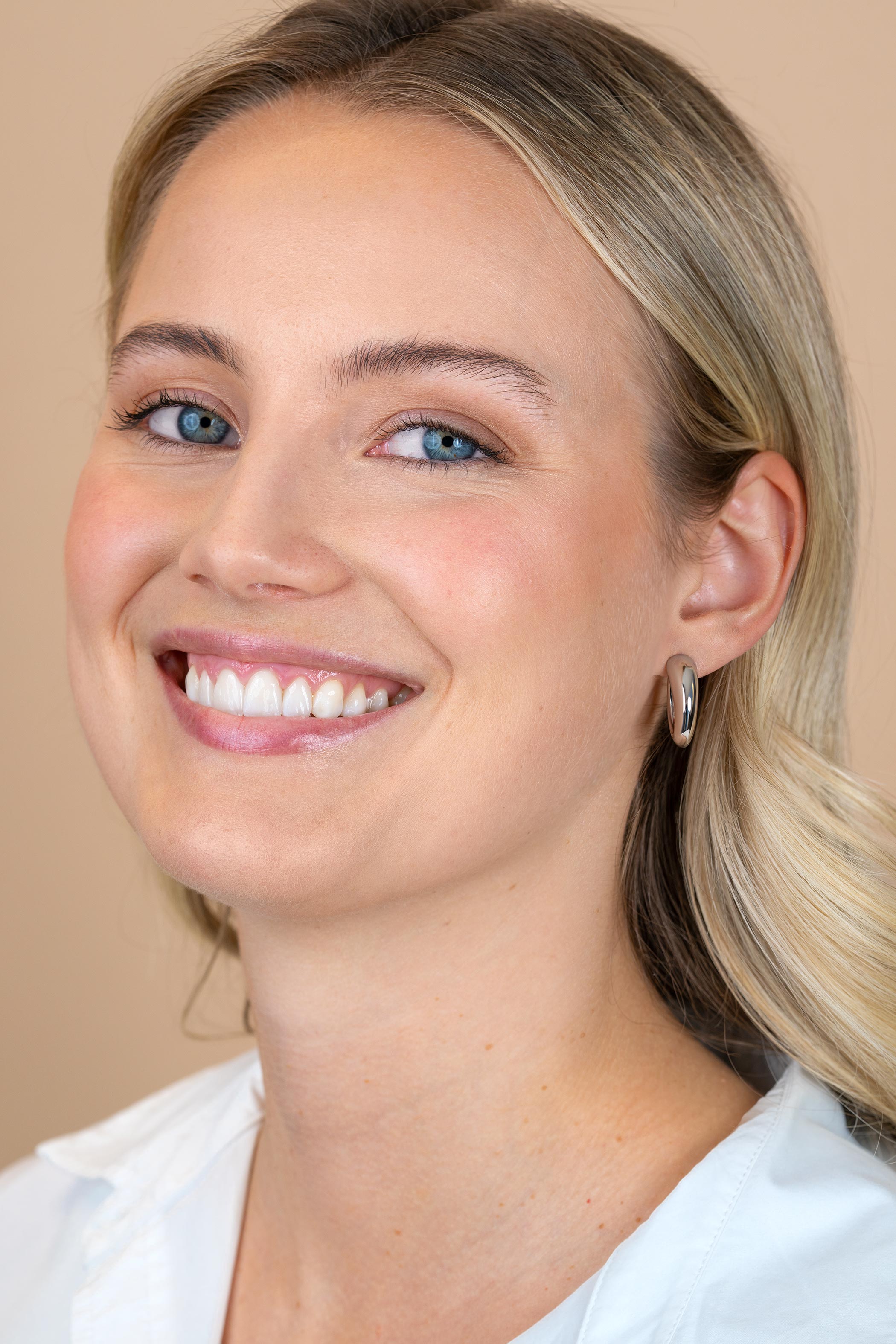 ZINZI zlv. oorsteker halfrond bol aflopend 21x7mm