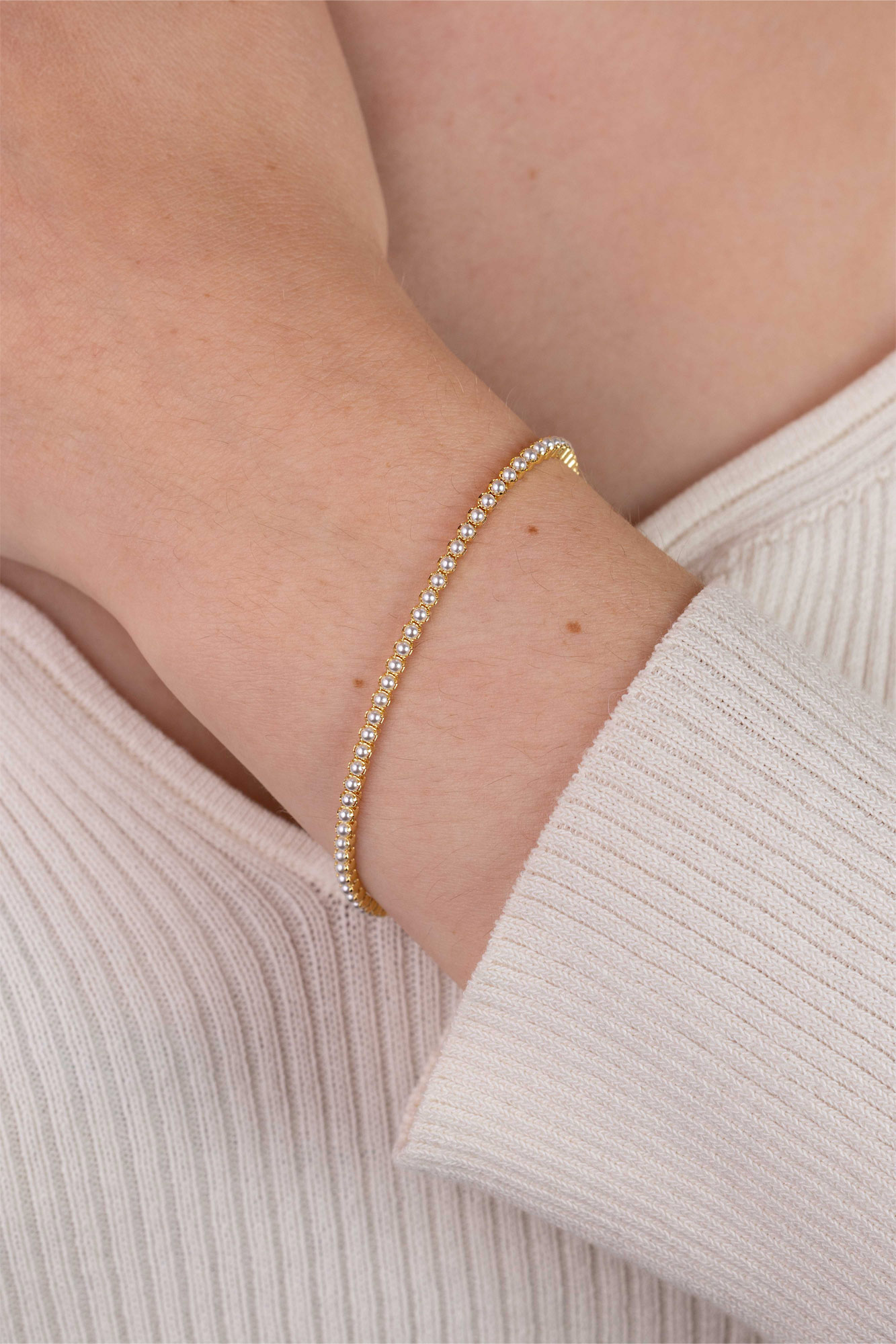 ZINZI zlv. tennisarmband gg.verg. met parels