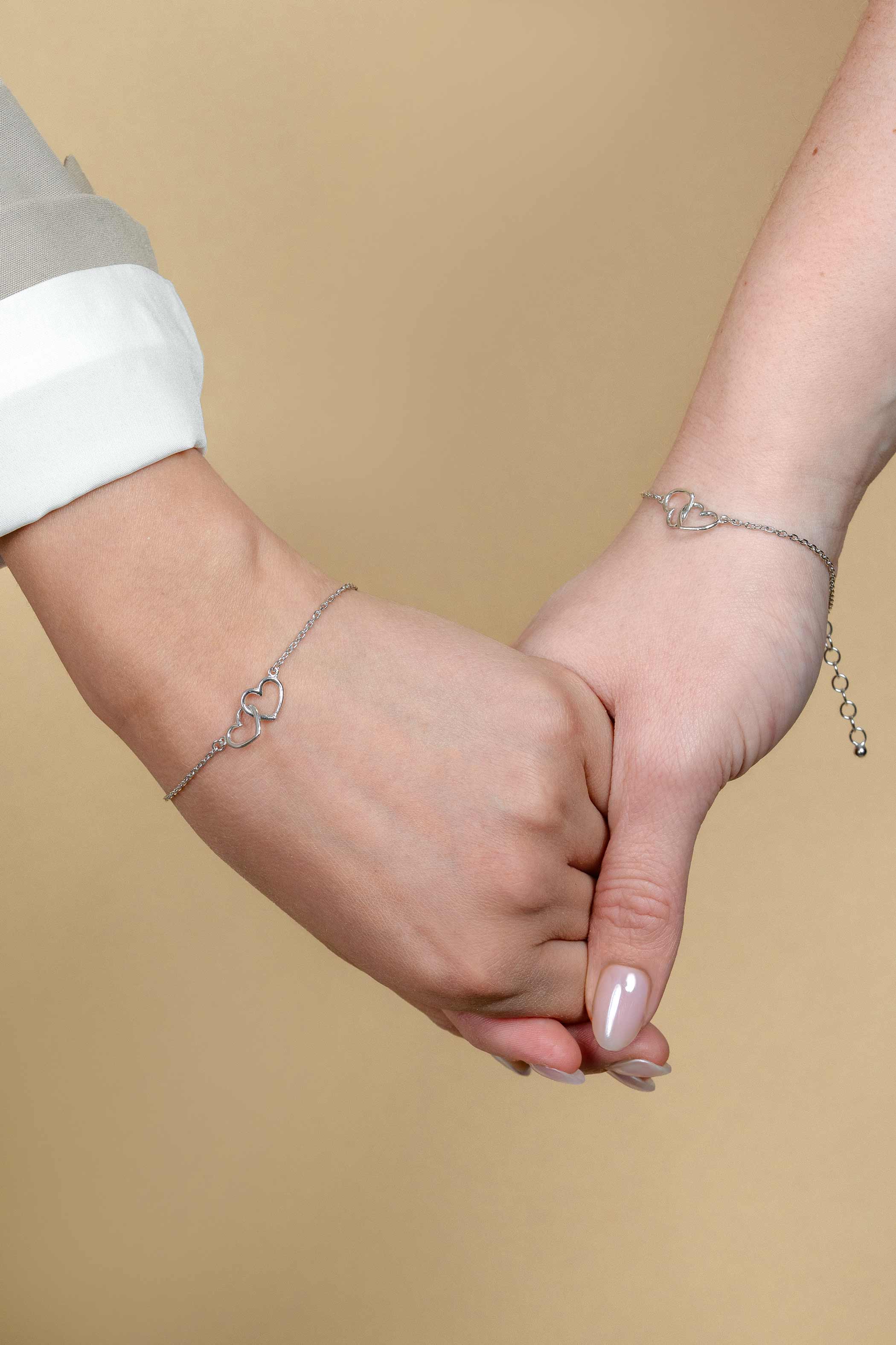 ZINZI set van 2 zlv. armbanden twee hartjes in elkaar