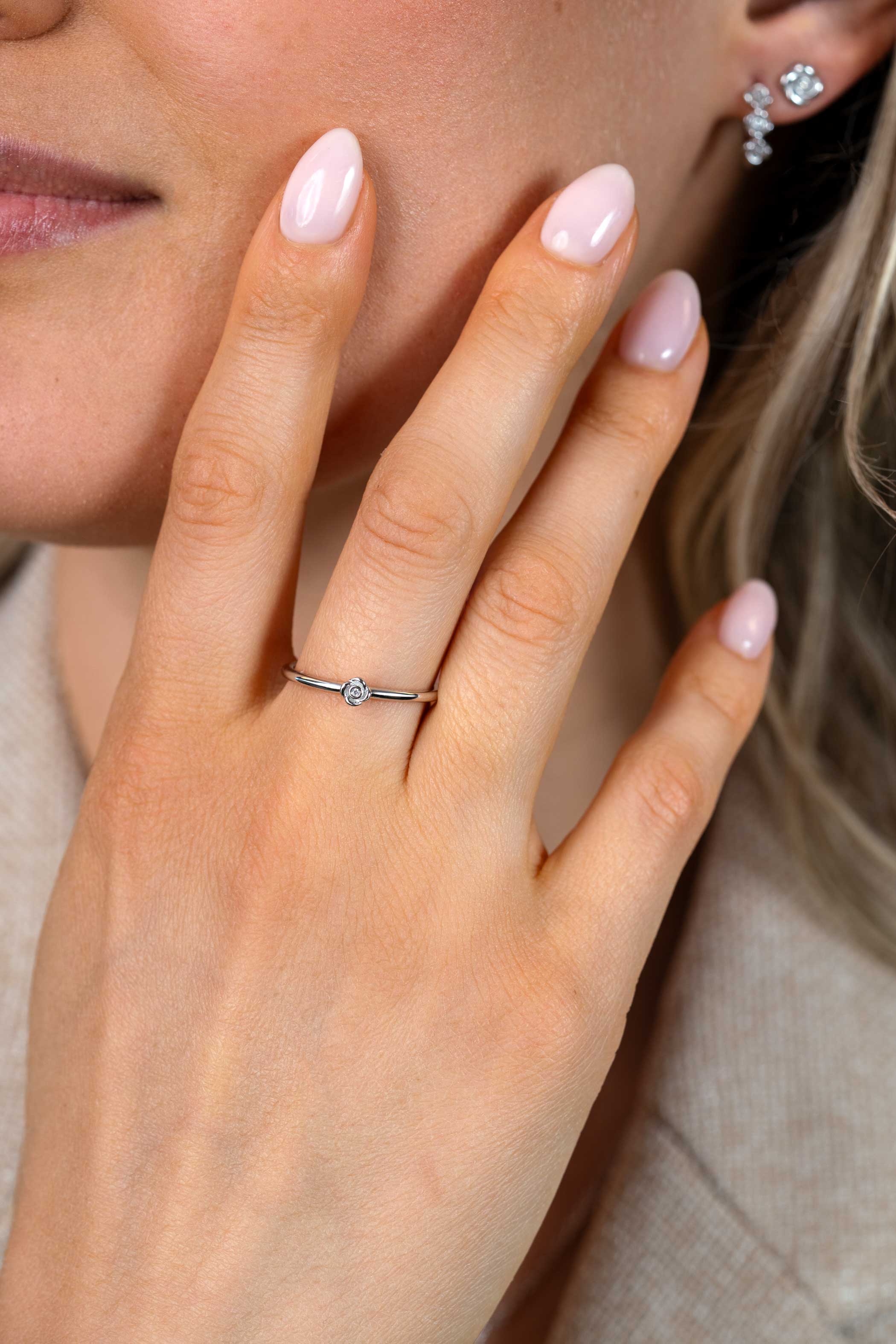 ZINZI zlv. ring met roosje en zirconia mt.62