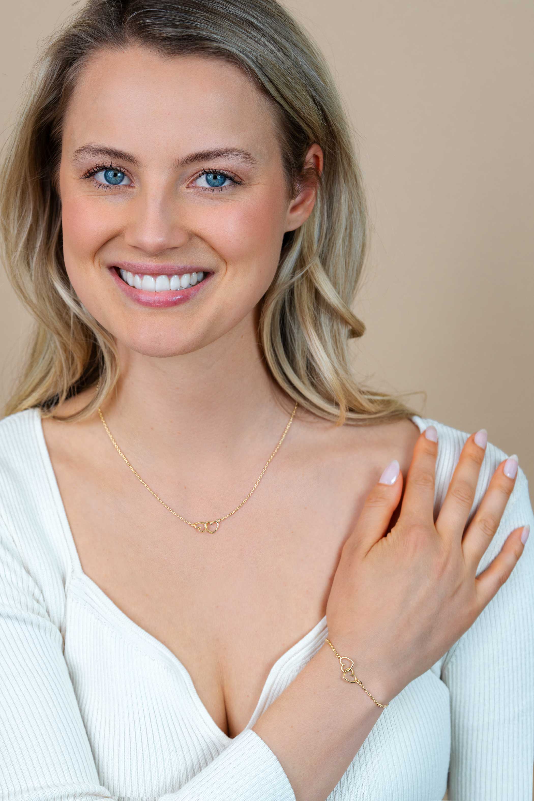 ZINZI zlv. armband gg.verg. twee hartjes in elkaar