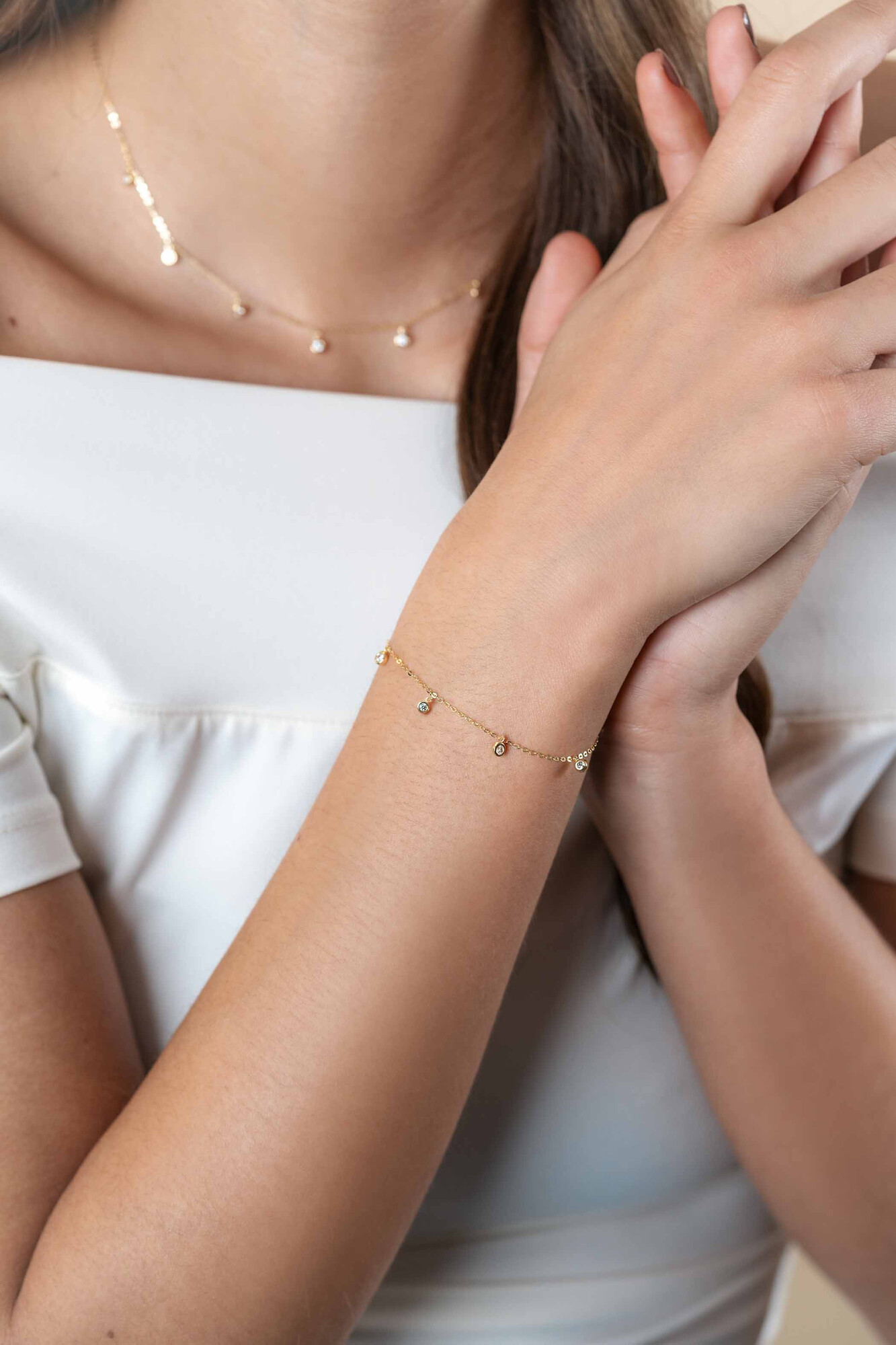 ZINZI GOLD armband met 7 zirc.hangertjes