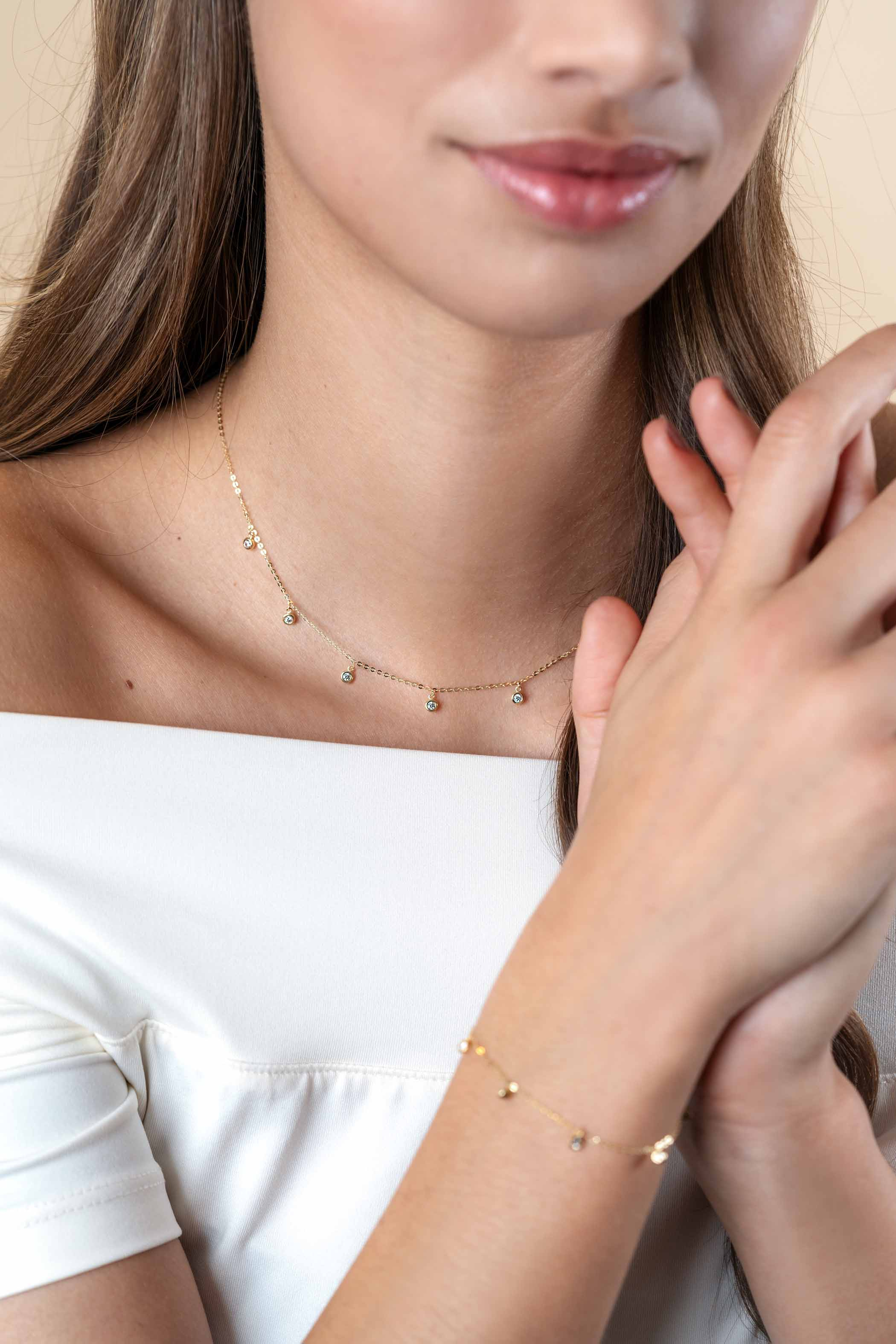 ZINZI GOLD collier met 7x zirc. hangertje 40/42cm