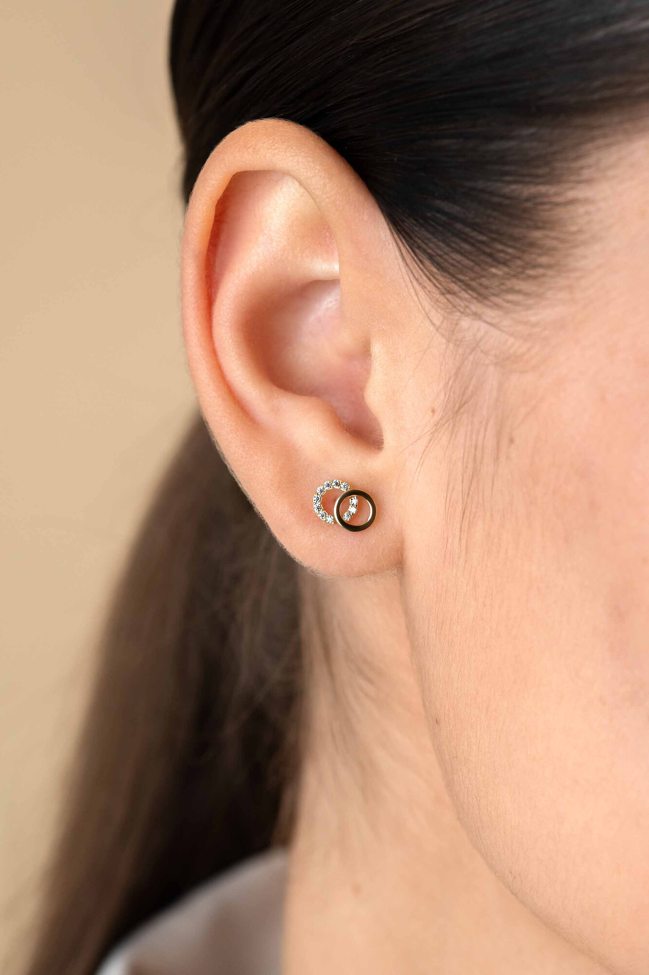 ZINZI GOLD oorknopjes 2 rond inelkaar 1 bezet zirc.