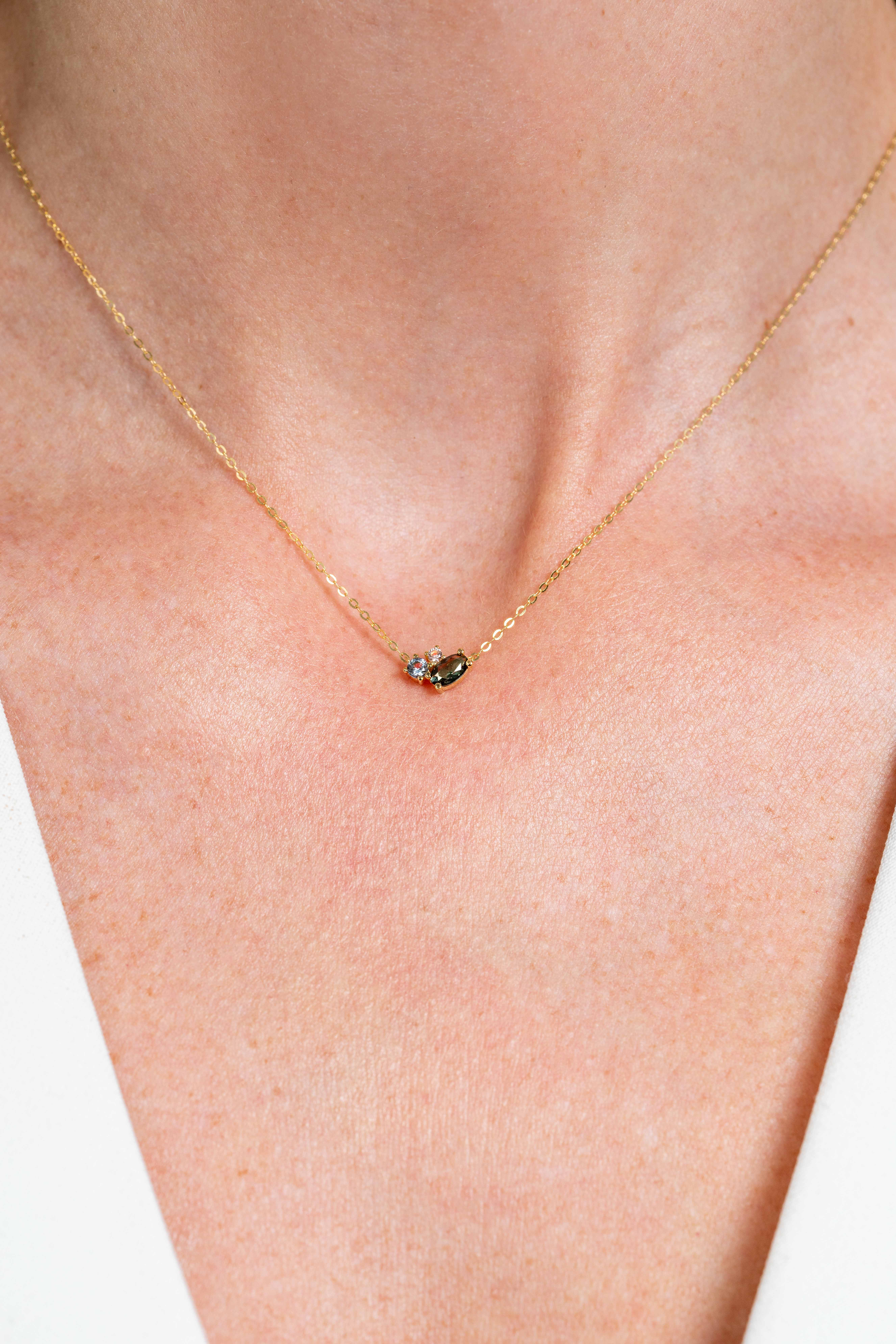 ZINZI GOLD collier met groen/blauw/champ zirc.