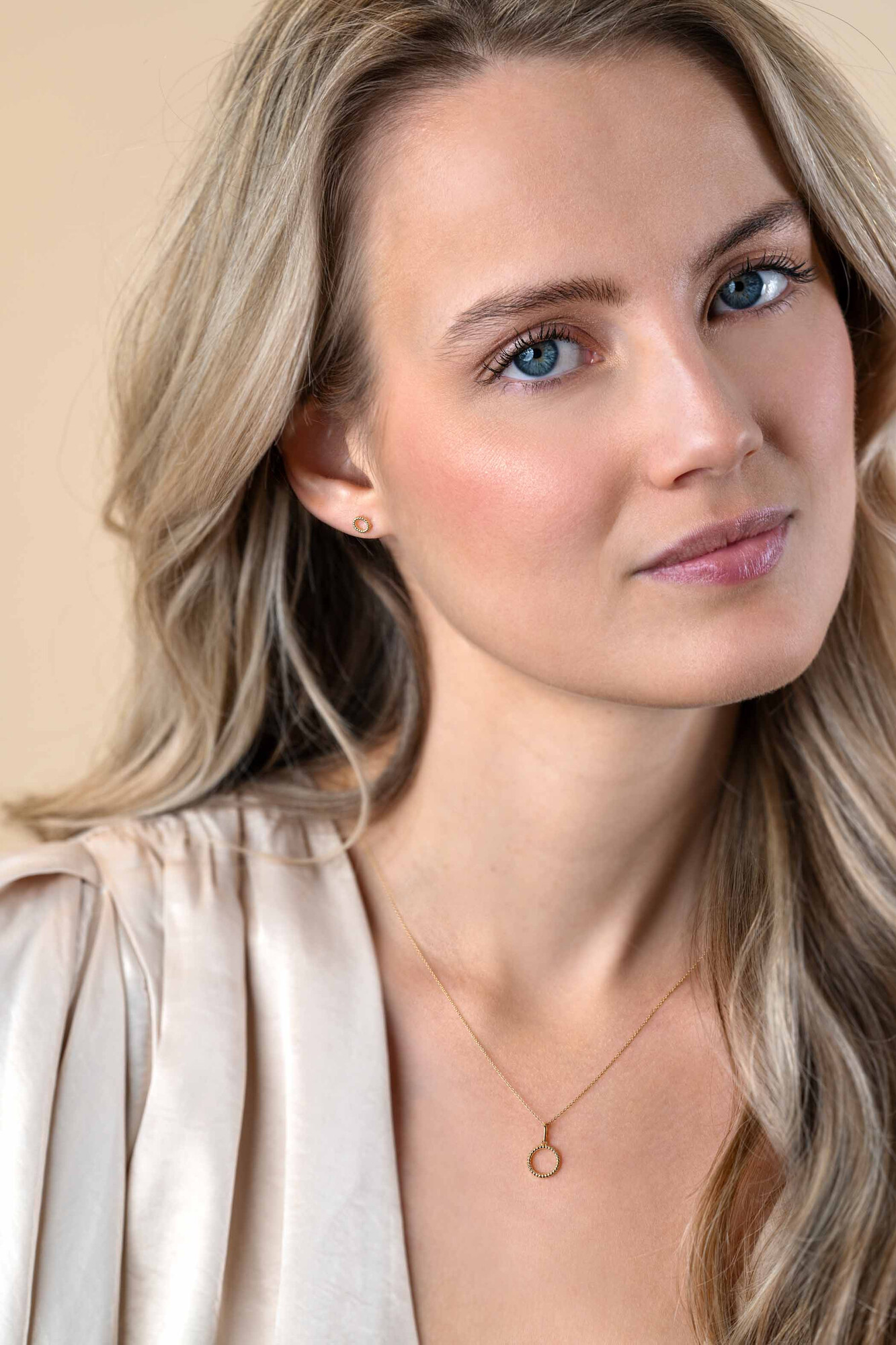 ZINZI GOLD oorknopjes open rond gedraaid 4.9mm