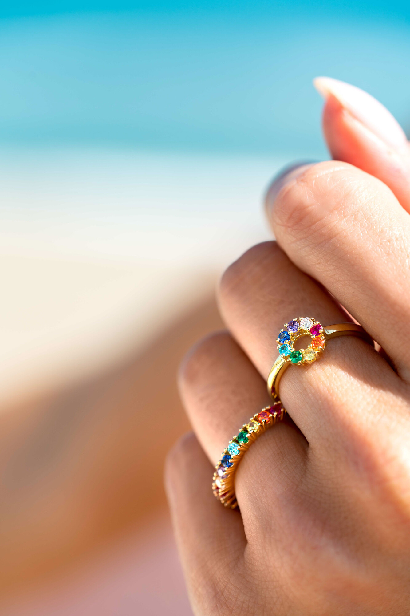 ZINZI zlv. aanschuif-rijring met zirc. regenboog mt.62