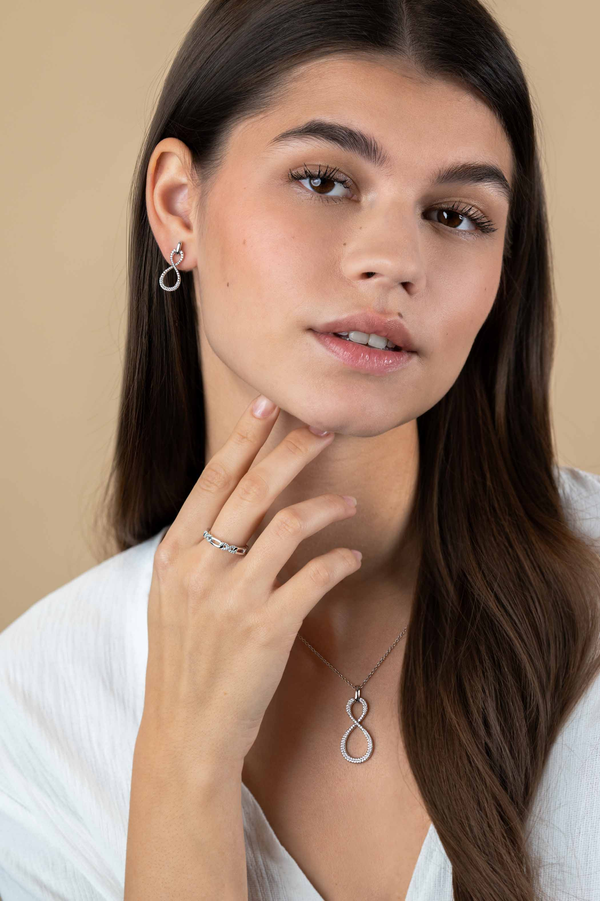 ZINZI zlv. ring infinity zirc. en ovale schakels mt.62