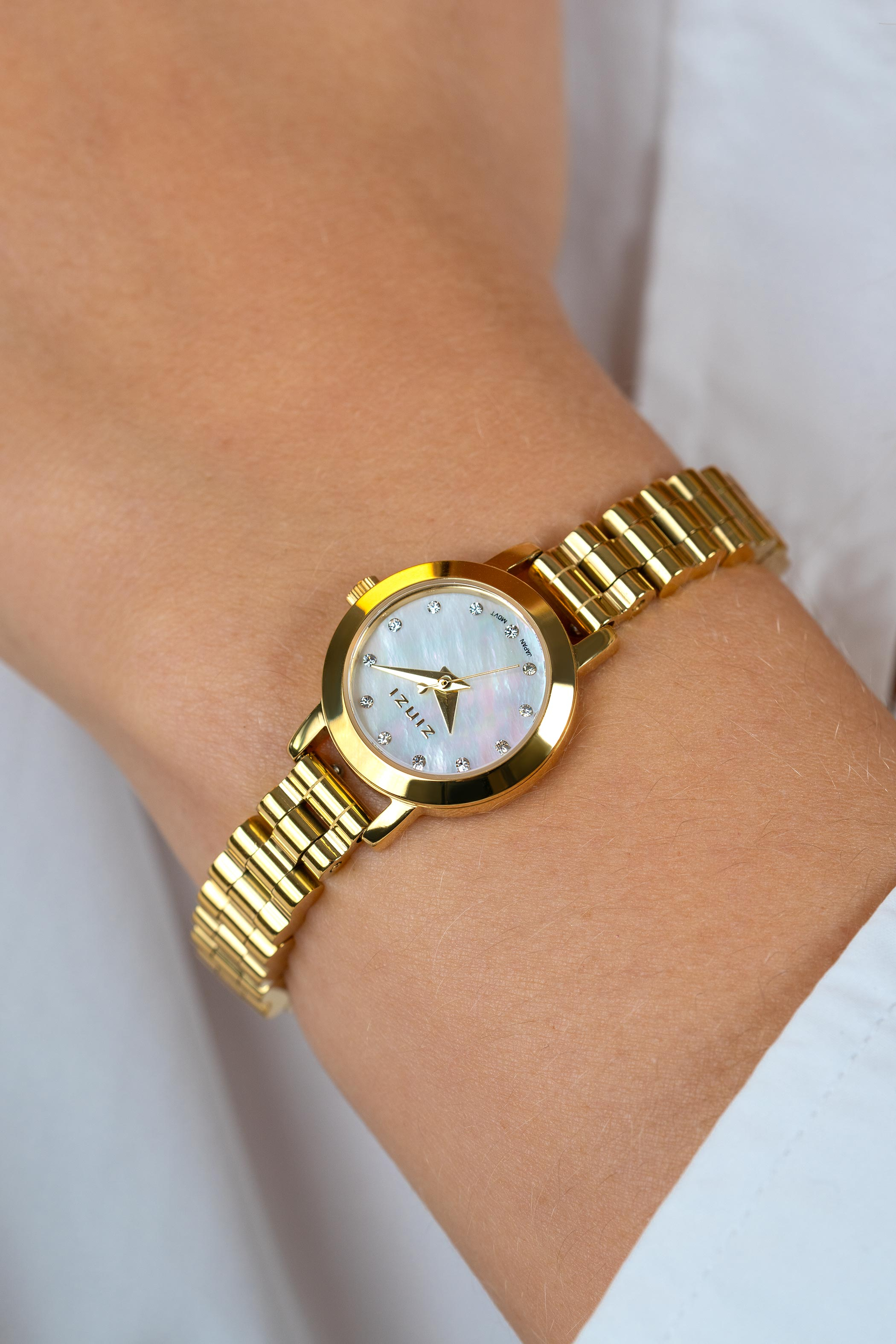 ZINZI Etoile Nuit Uhr 20 mm weißes Perlmutt-Zifferblatt Gelbgoldfarbige Stahlgehäuse und Armband ZIW3134