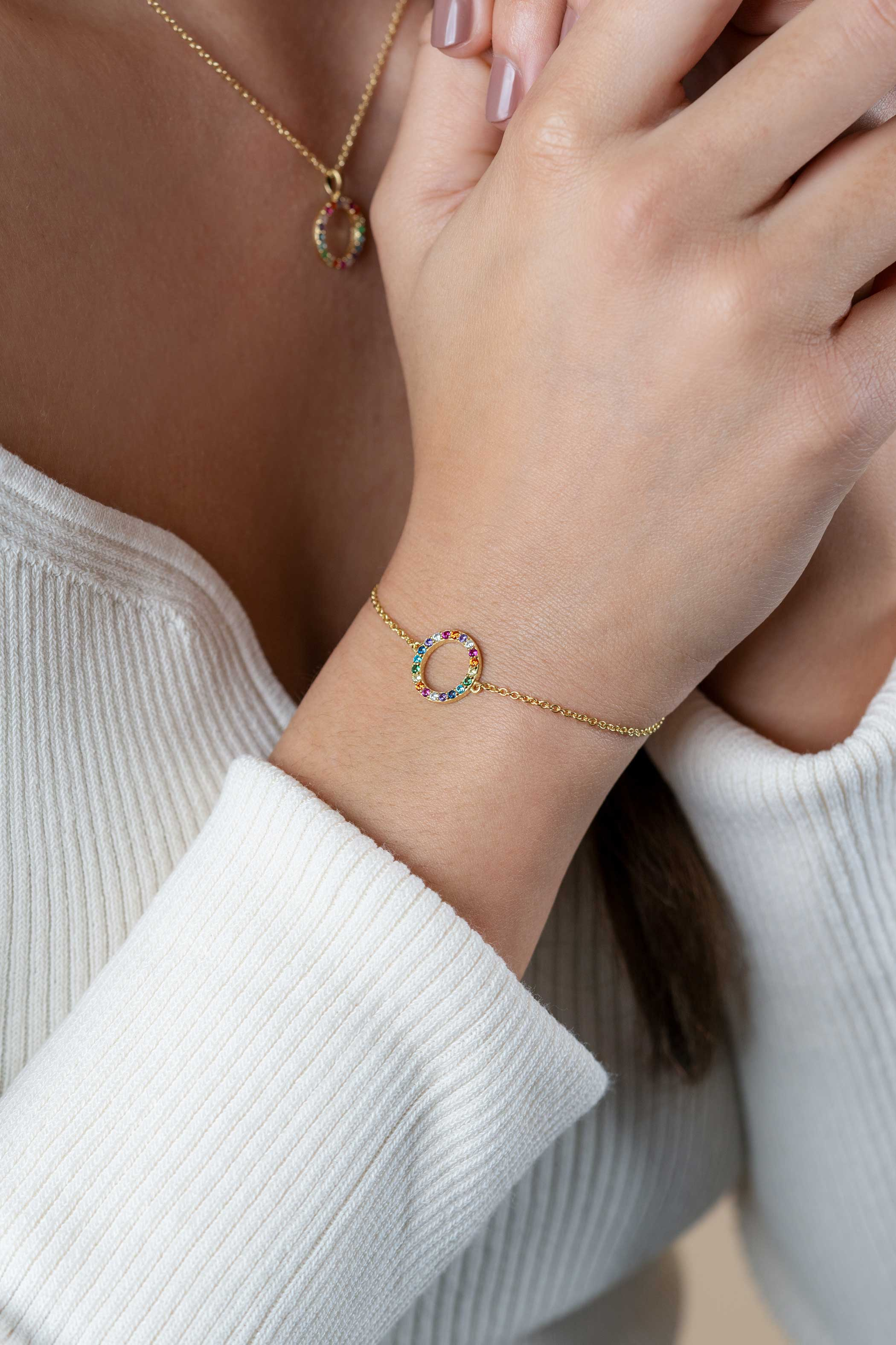 ZINZI zlv. armband gg.verg. open rondje regenboog