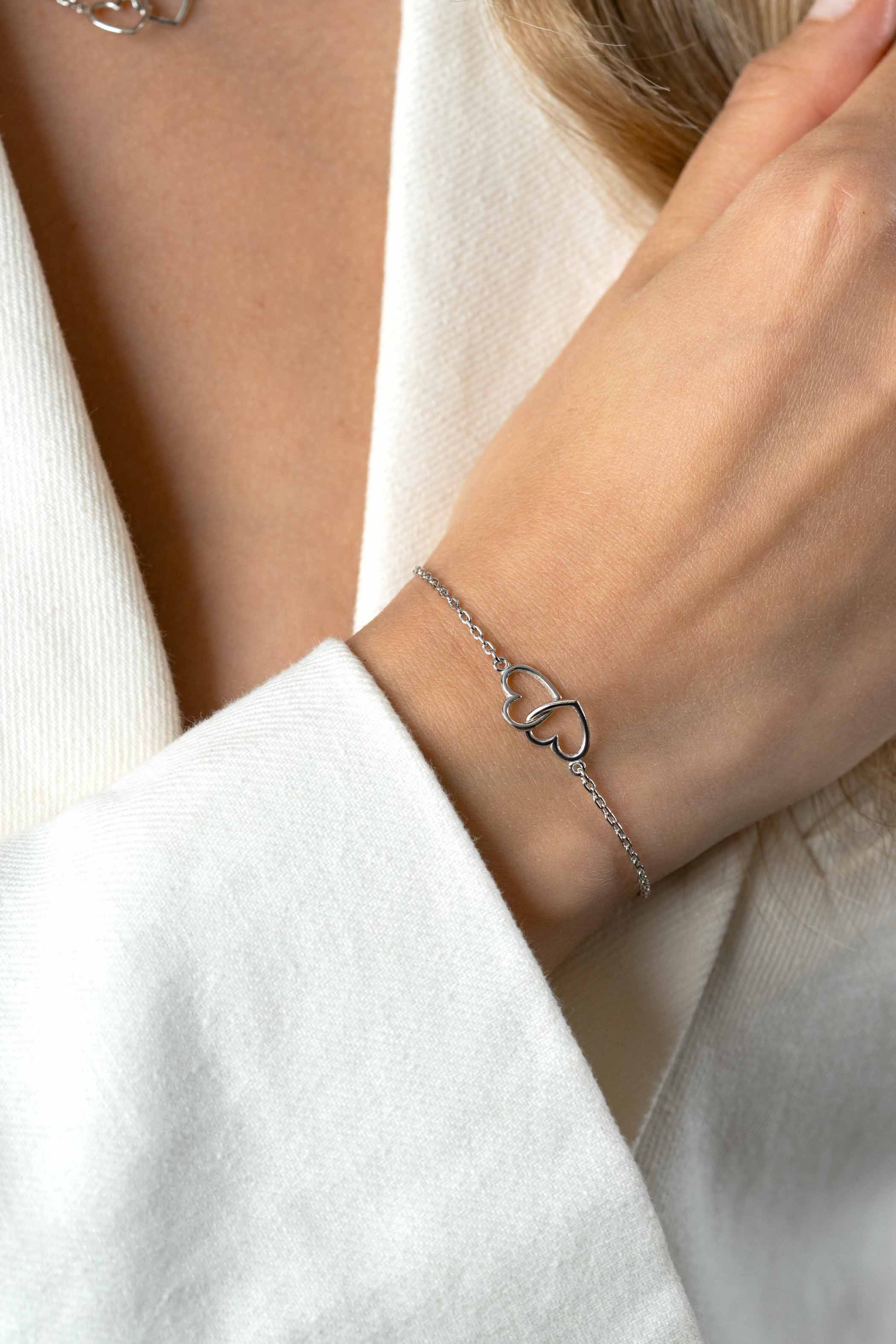 ZINZI zlv. armband twee hartjes in elkaar