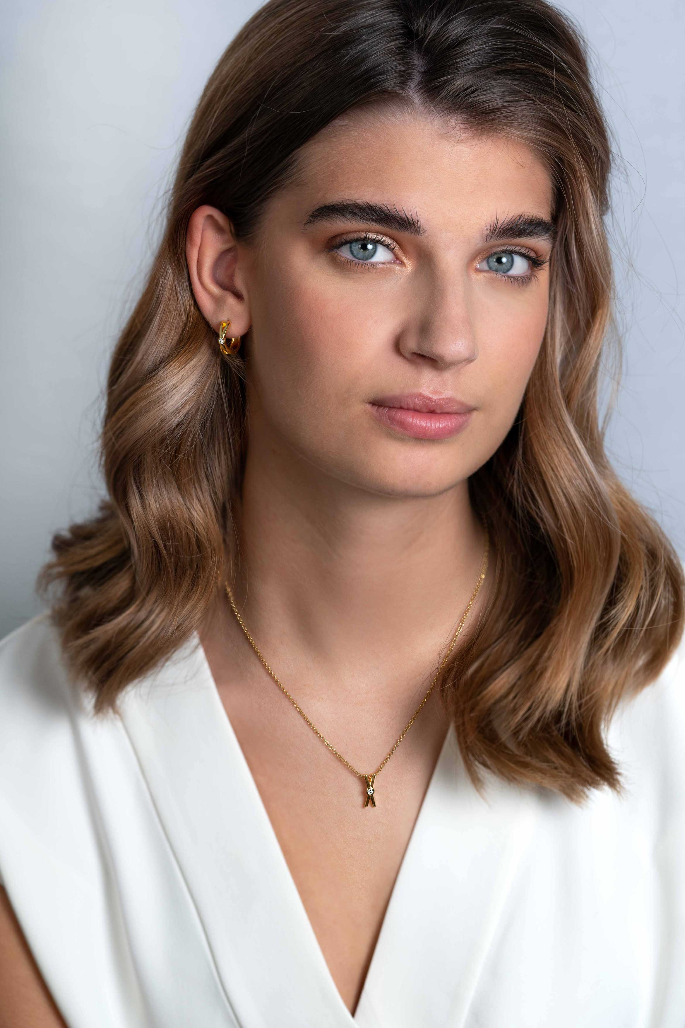 ZINZI silberne Ohrringe extra 14K gelb vergoldet mit X-Form und weißen Zirkonia 17x5mm ZIO2194Y