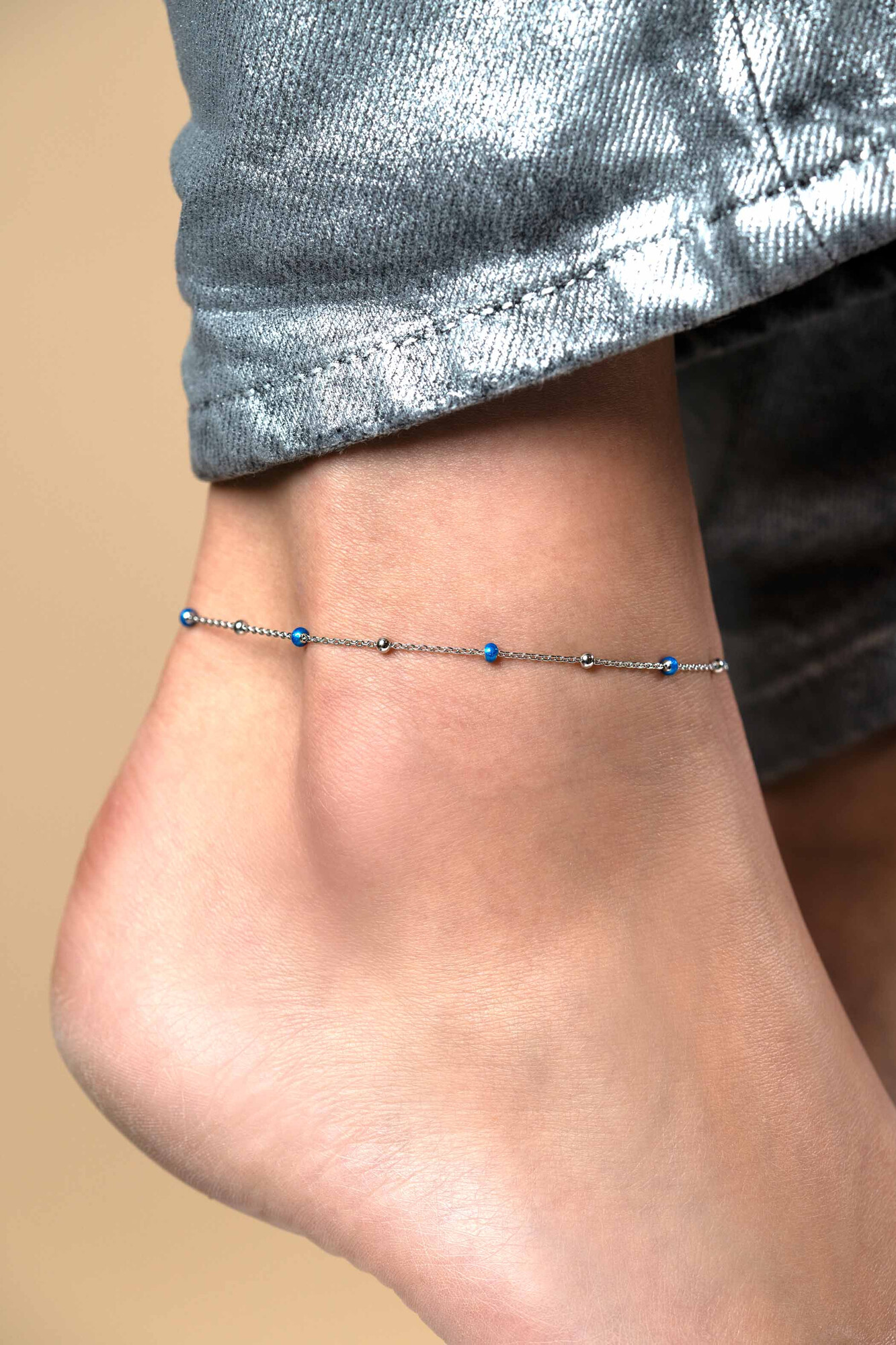 ZINZI zlv. enkelband met zlv.en blauwe bolletjes