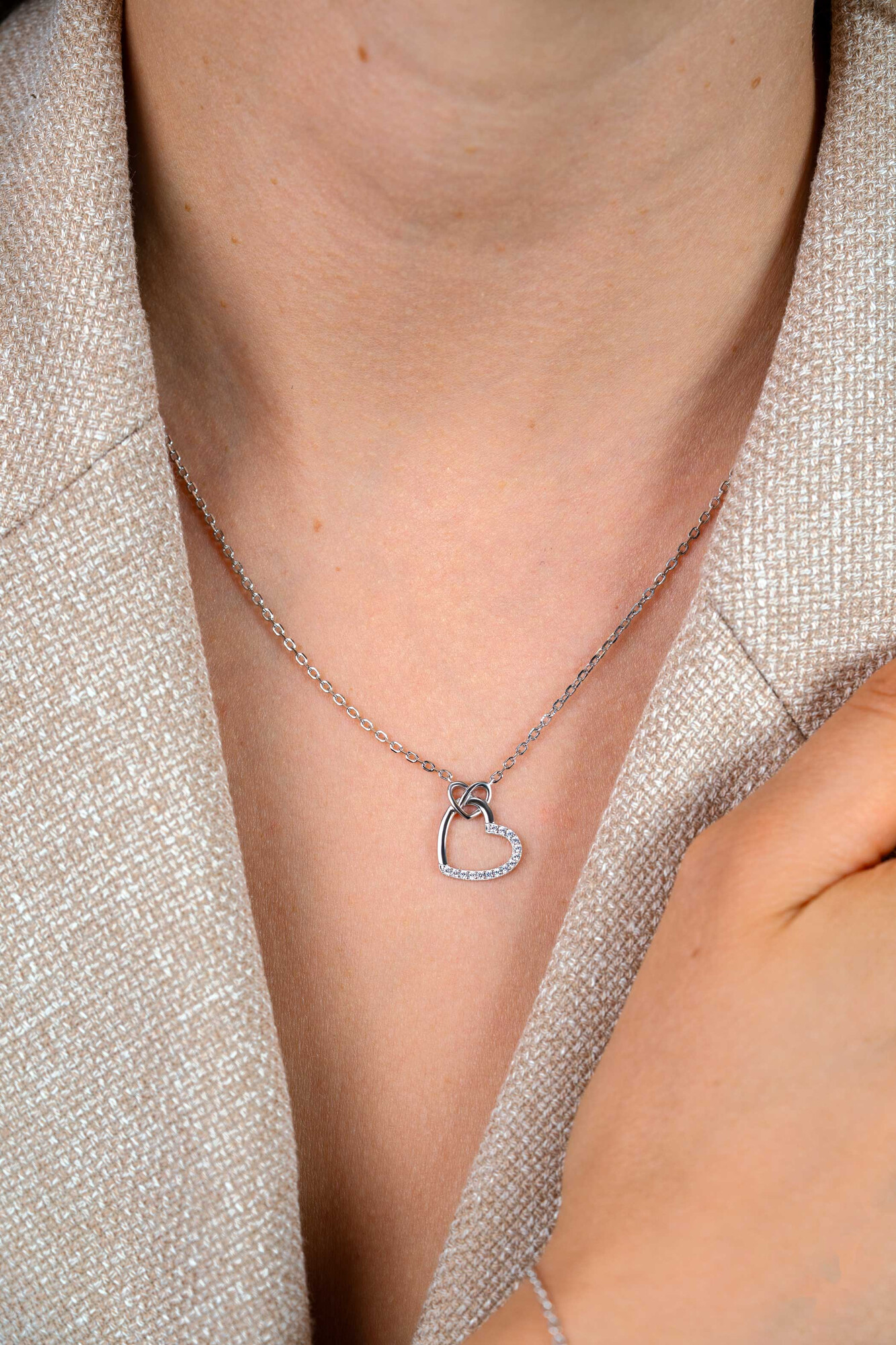 ZINZI zlv. collier twee harten verbonden zirc.