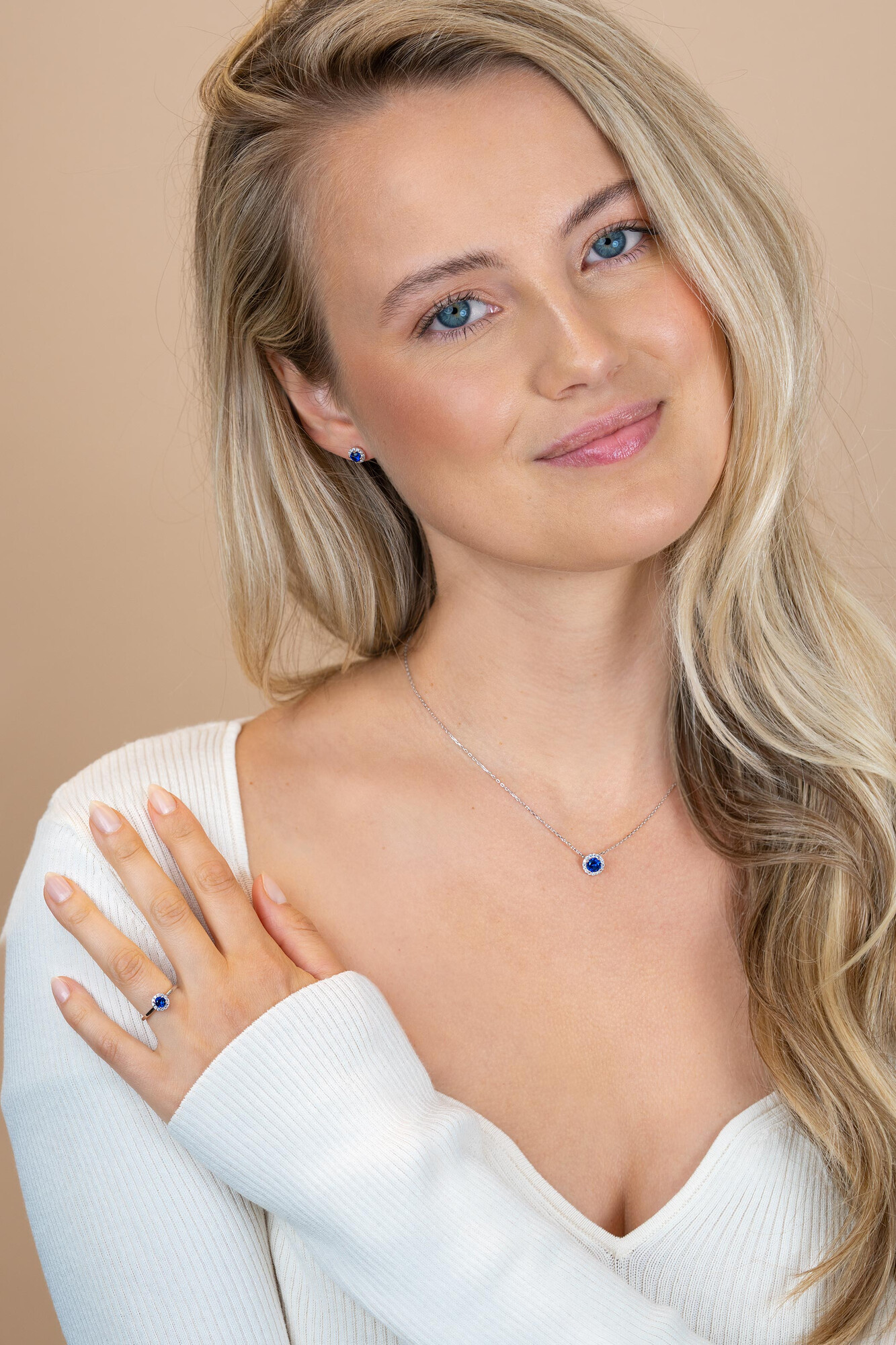 ZINZI zlv. oorknopjes entourage blauw en zirconia's