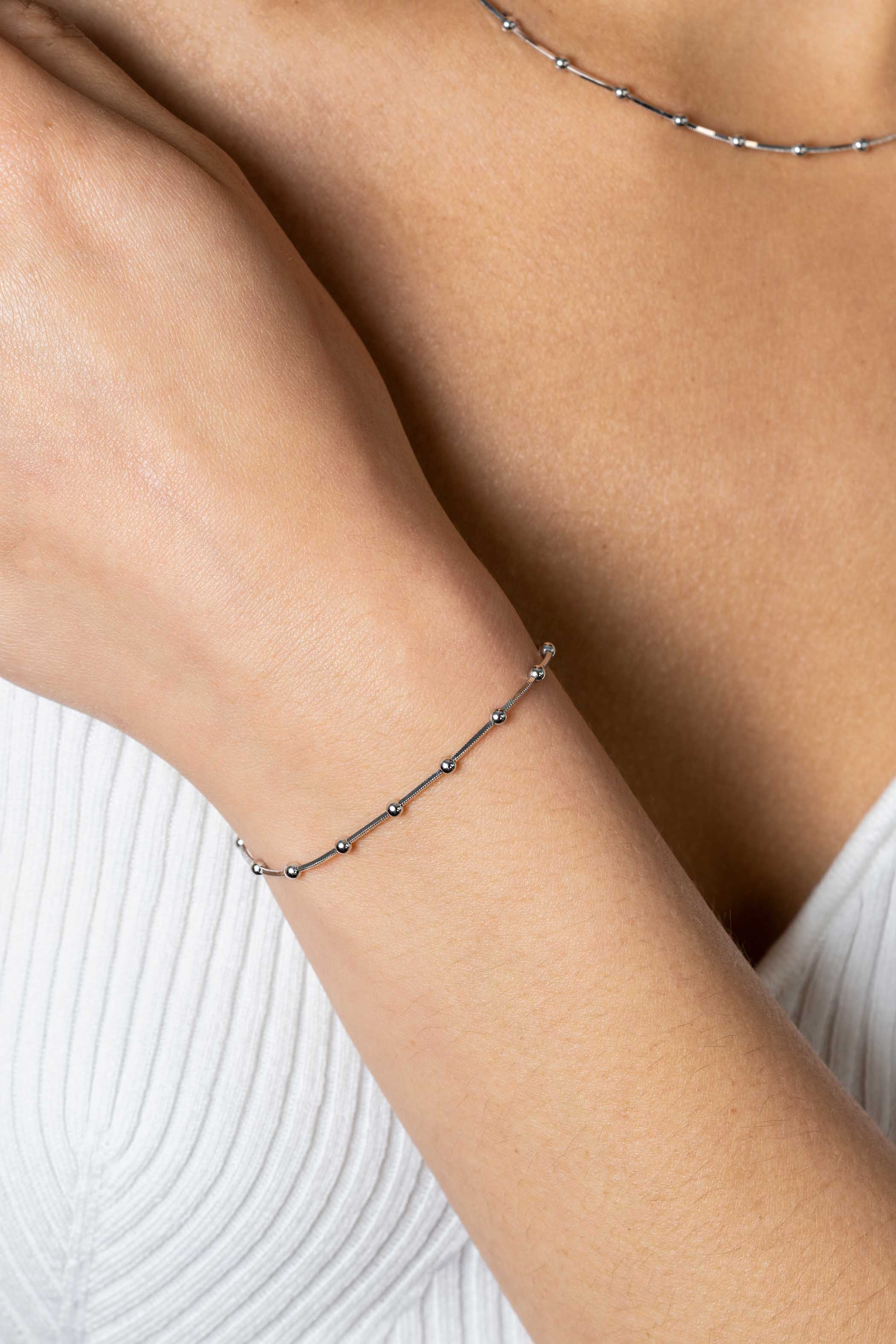 ZINZI zlv. slangenarmband met bolletjes