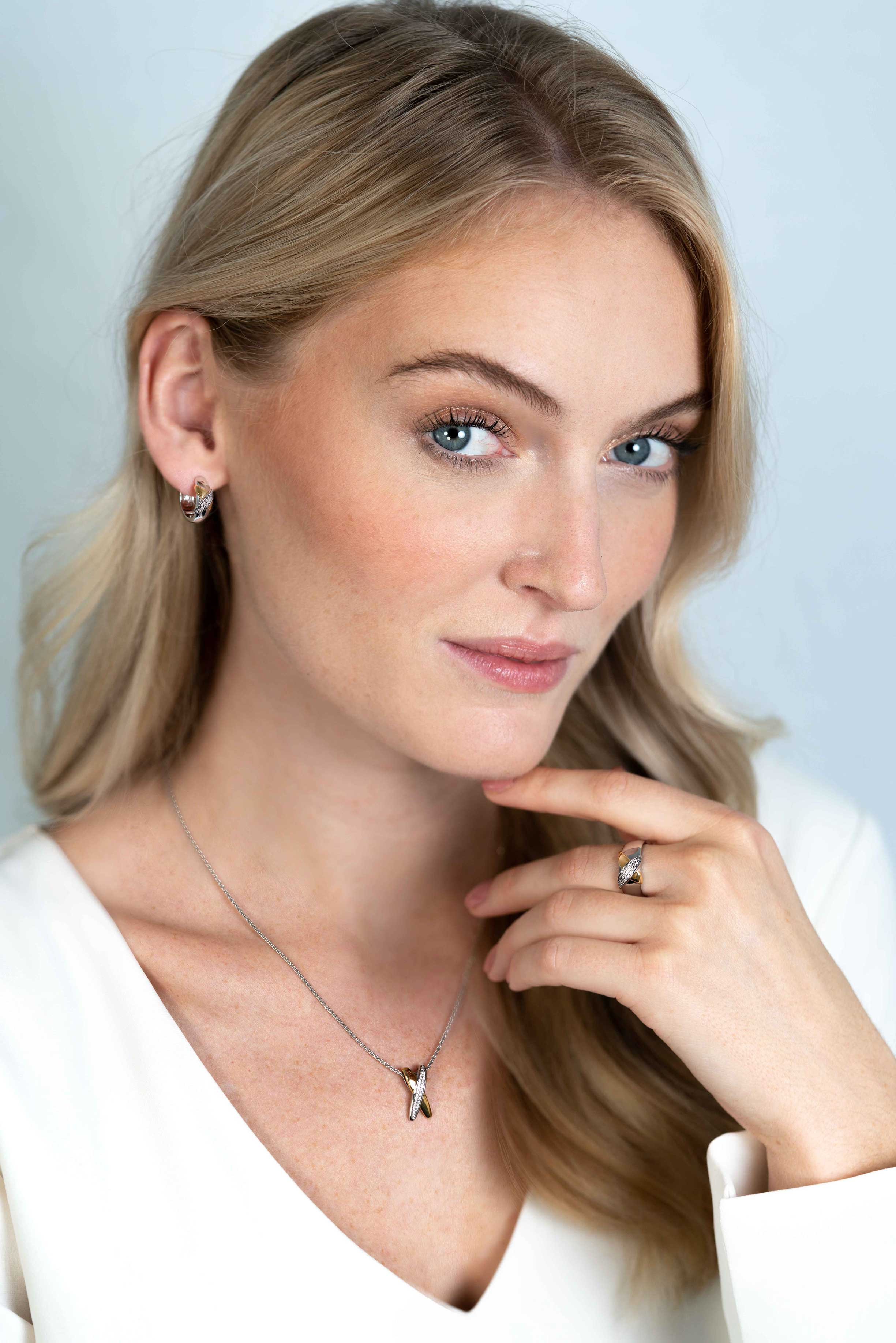 ZINZI Silberner bicolor Ring cross-over besetzt mit weißen Zirkonia ZIR2240