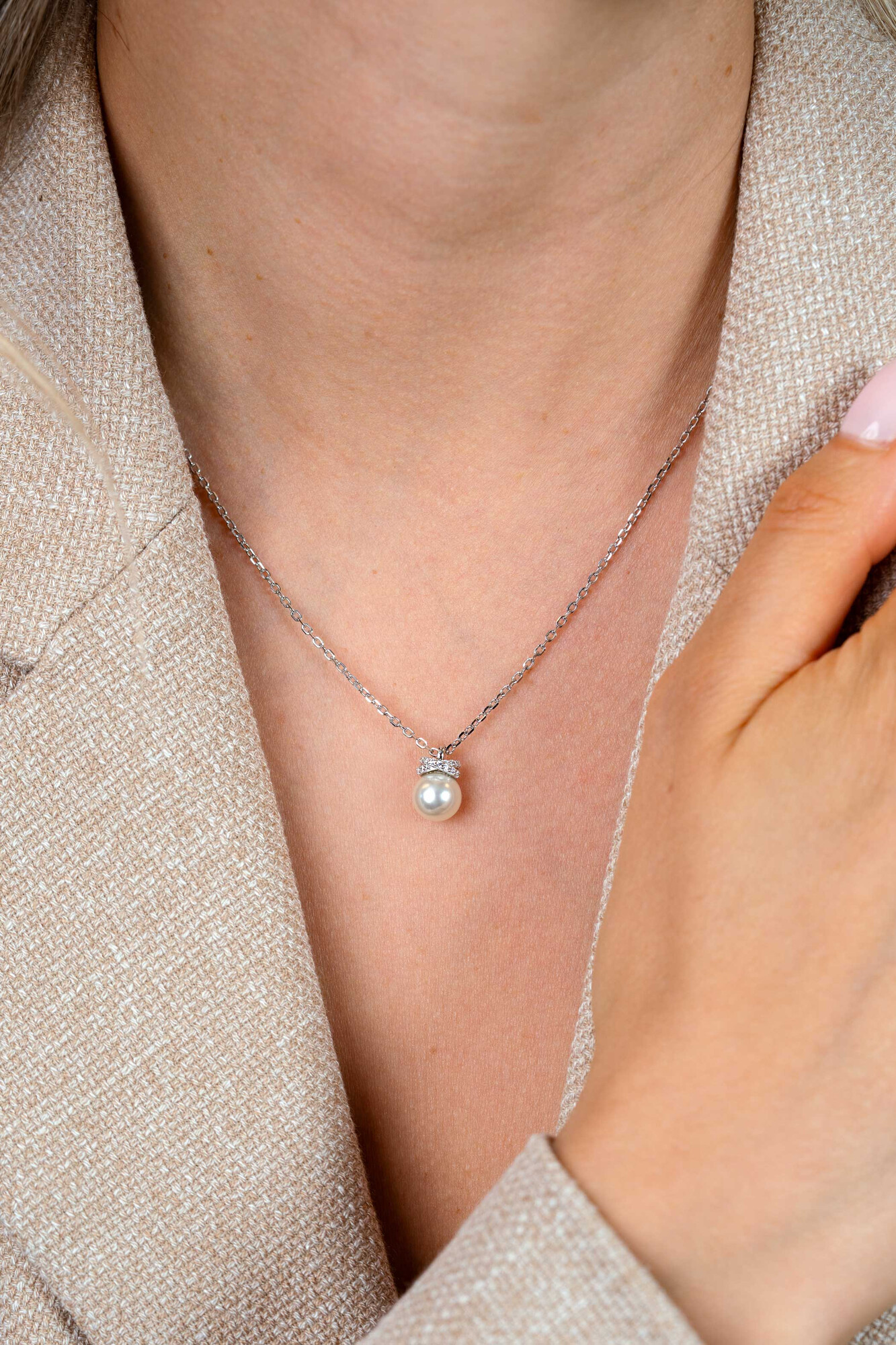 ZINZI zlv. collier met parel hanger en kruislings ziirc.