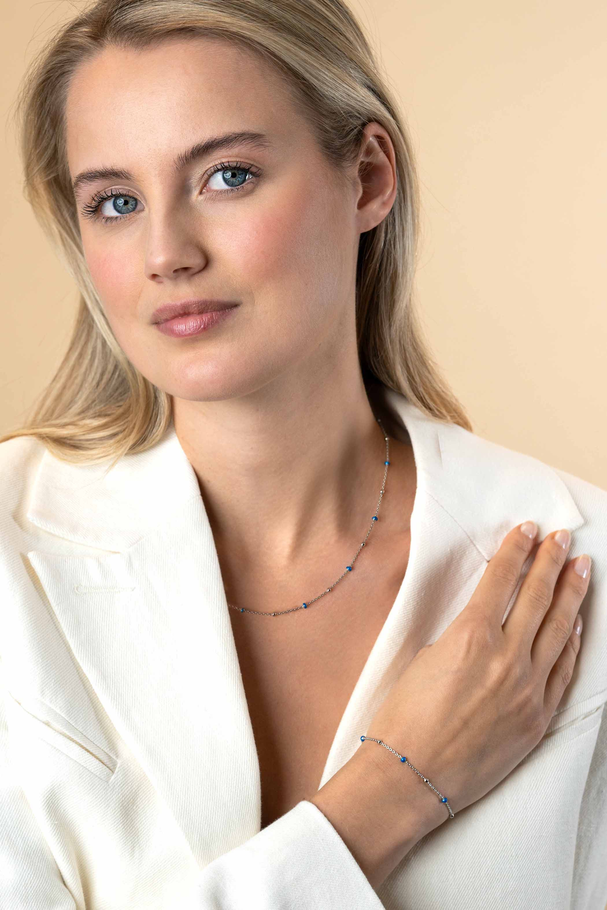 ZINZI zlv. armband met zlv.en blauwe bolletjes