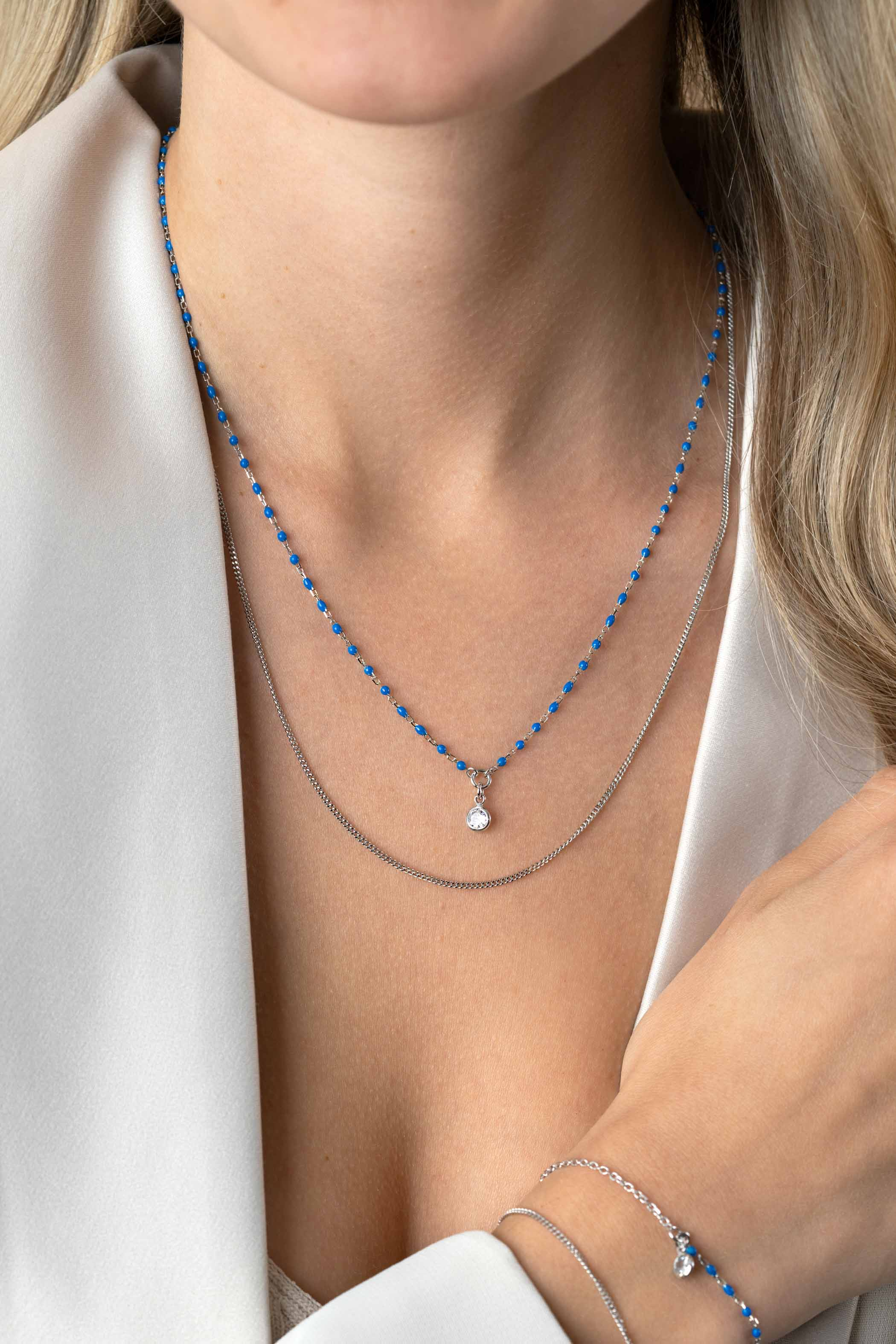 ZINZI zlv.2x collier grmt. en blauwe bolletjes en zirc.