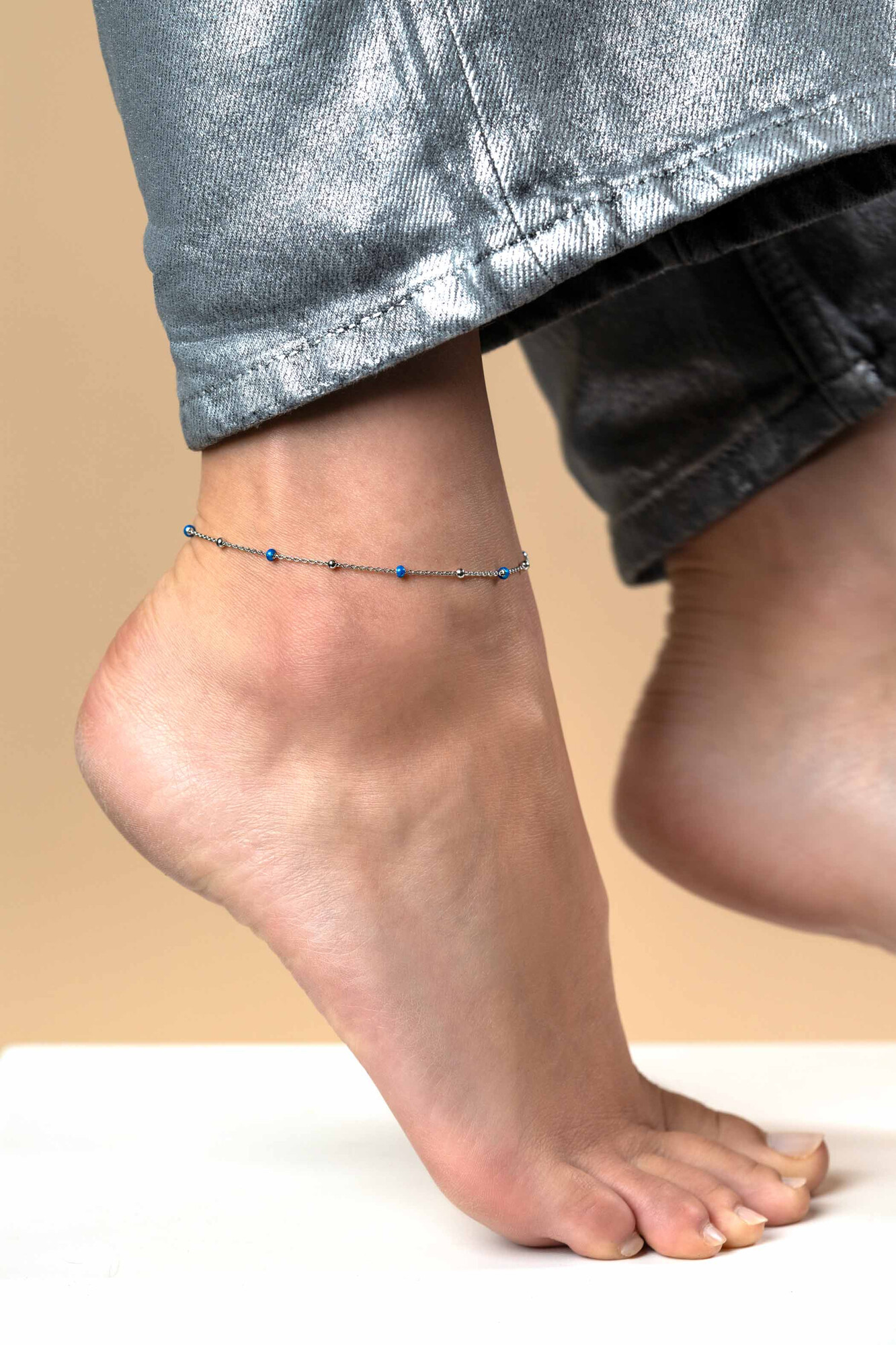 ZINZI zlv. enkelband met zlv.en blauwe bolletjes