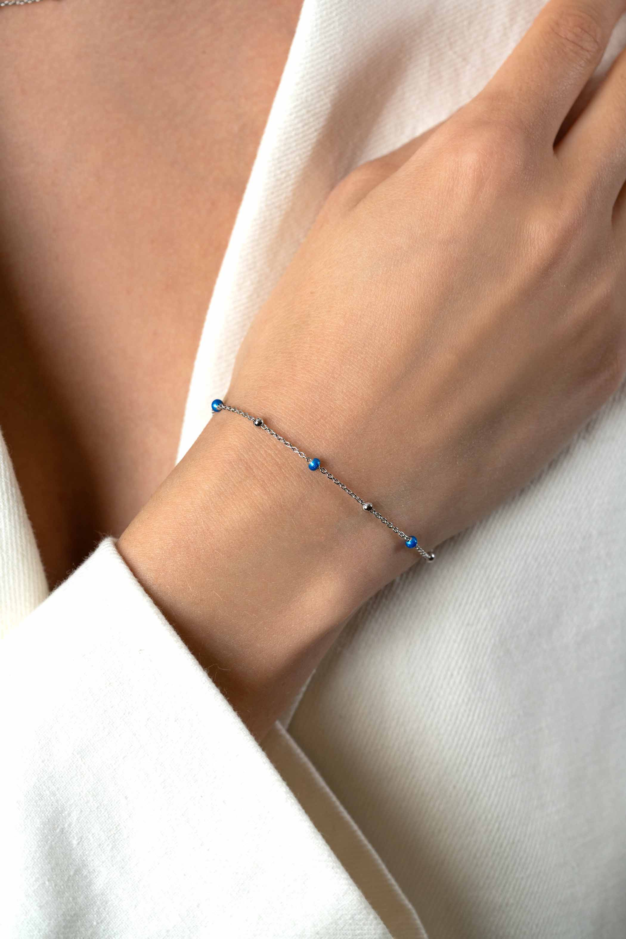 ZINZI zlv. armband met zlv.en blauwe bolletjes