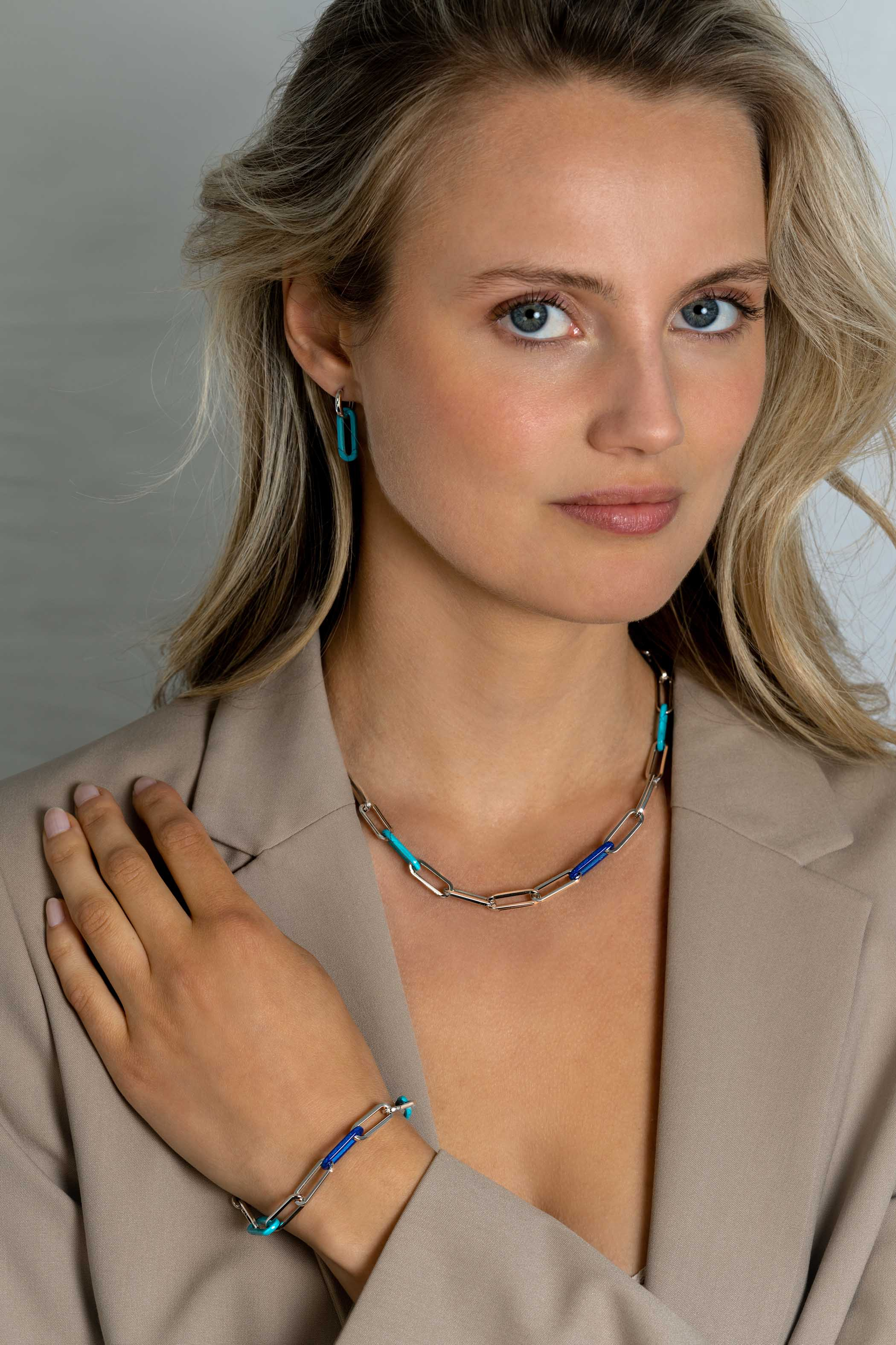 ZINZI zlv. oorbedels turquoise ovaal 20mm lang