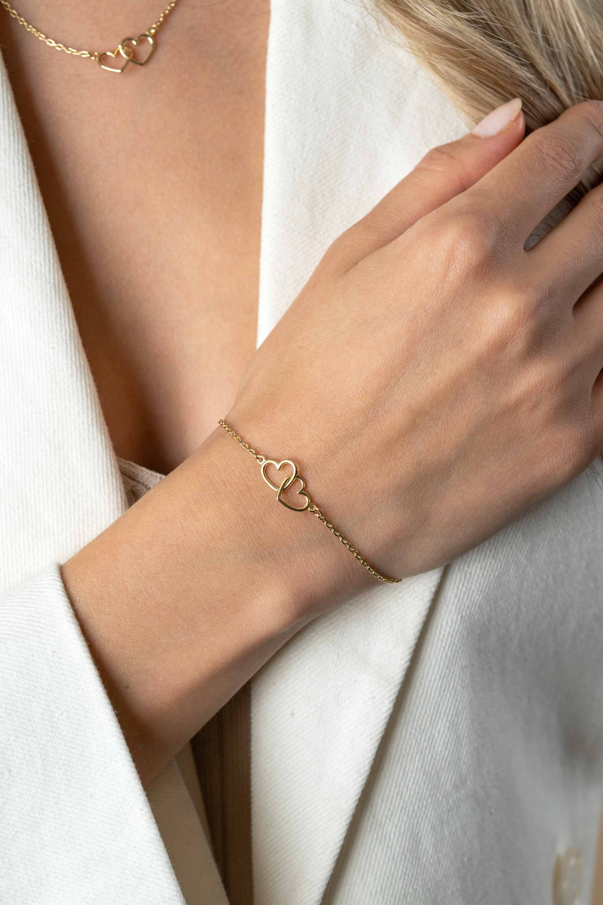 ZINZI zlv. armband gg.verg. twee hartjes in elkaar