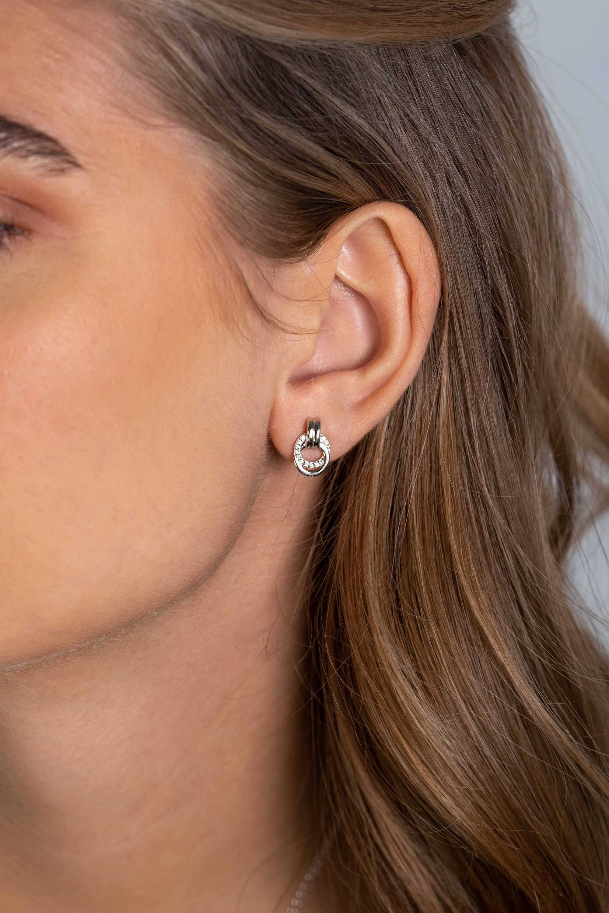 ZINZI silberne Ohrstecker 13mm mit einander verbunden runde Formen glatt und weiße zirconia ZIO2266