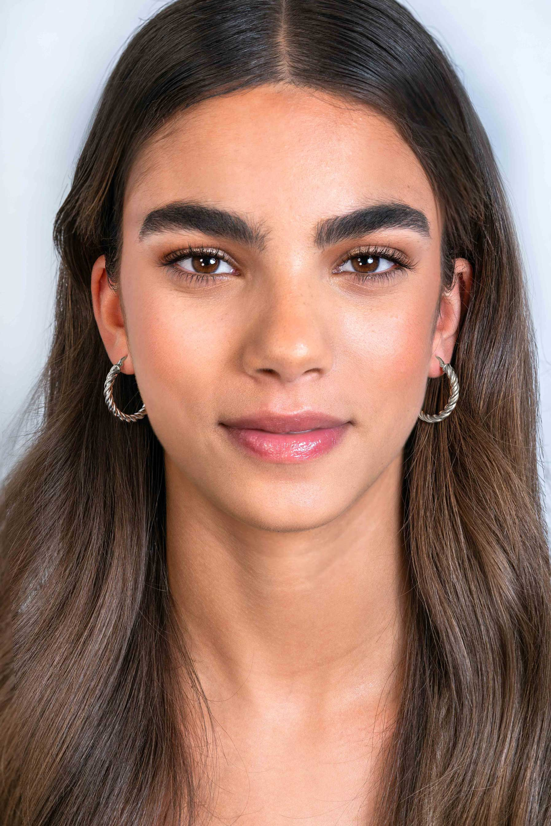 ZINZI * zlv. oorringen gedraaid 27x4mm