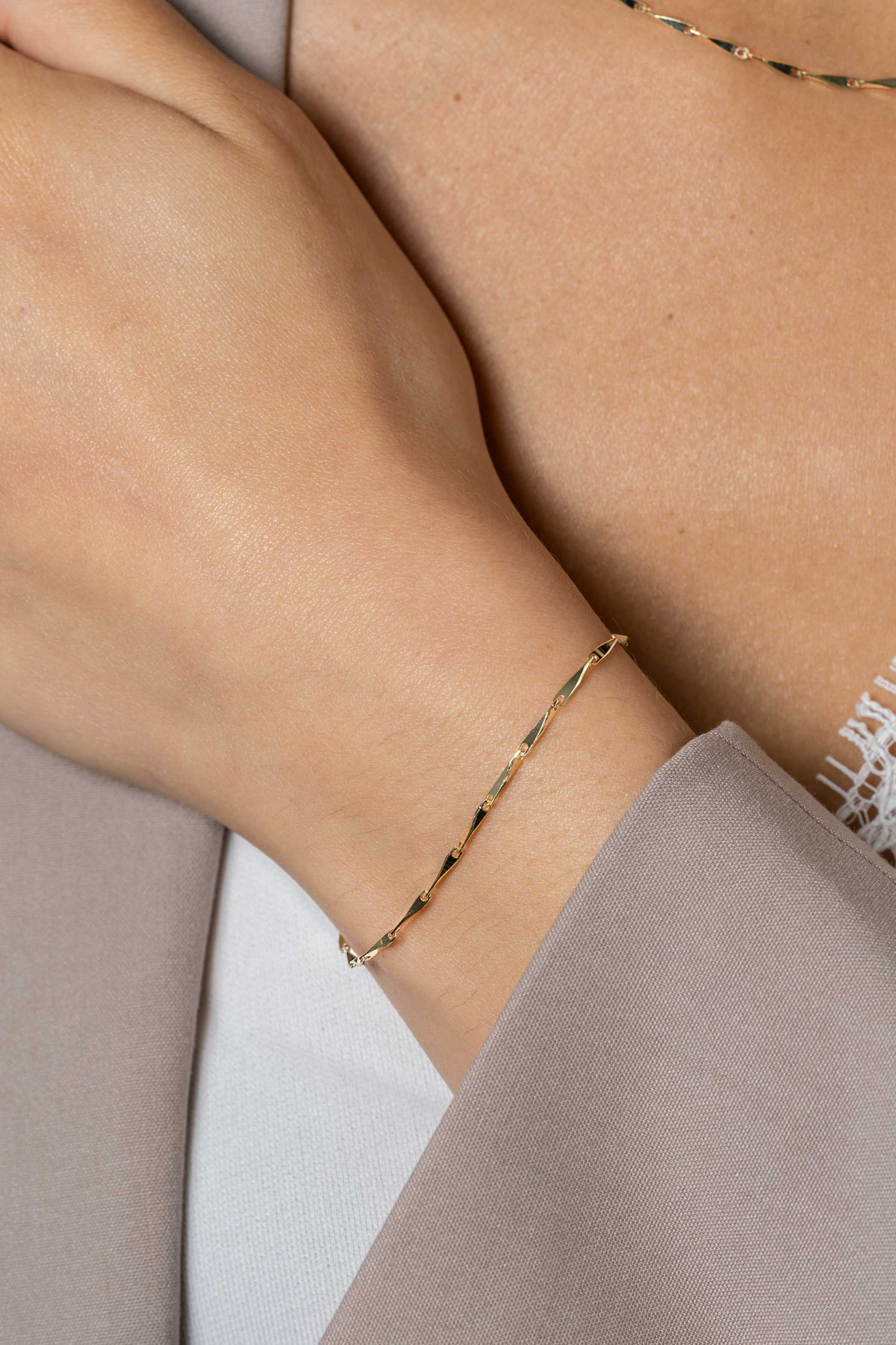 ZINZI zlv. armband gg.verg. met gedraaide schakels