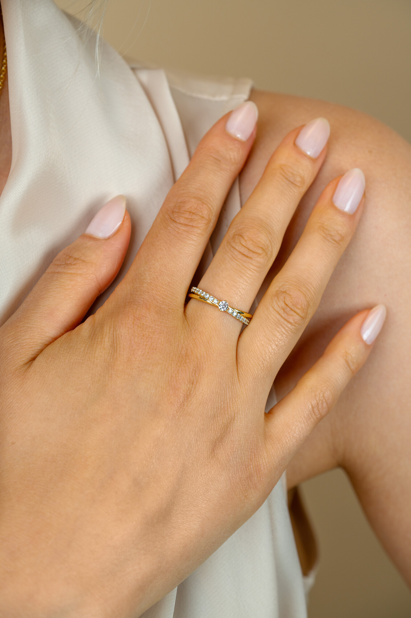 ZINZI zlv. ring gg.verg.cross-over met ziconia's mt.58