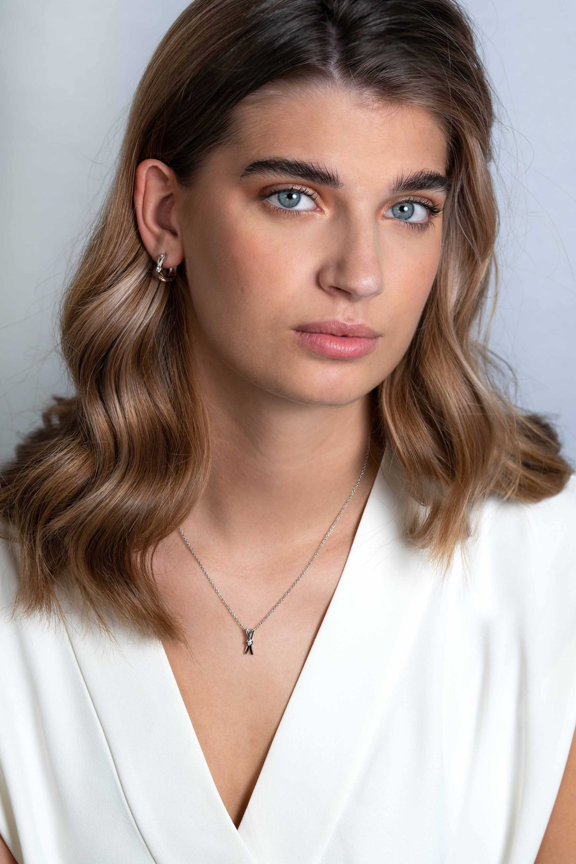 ZINZI silberne Ohrringe mit X-Form und weißen Zirkonia 17x5mm ZIO2194