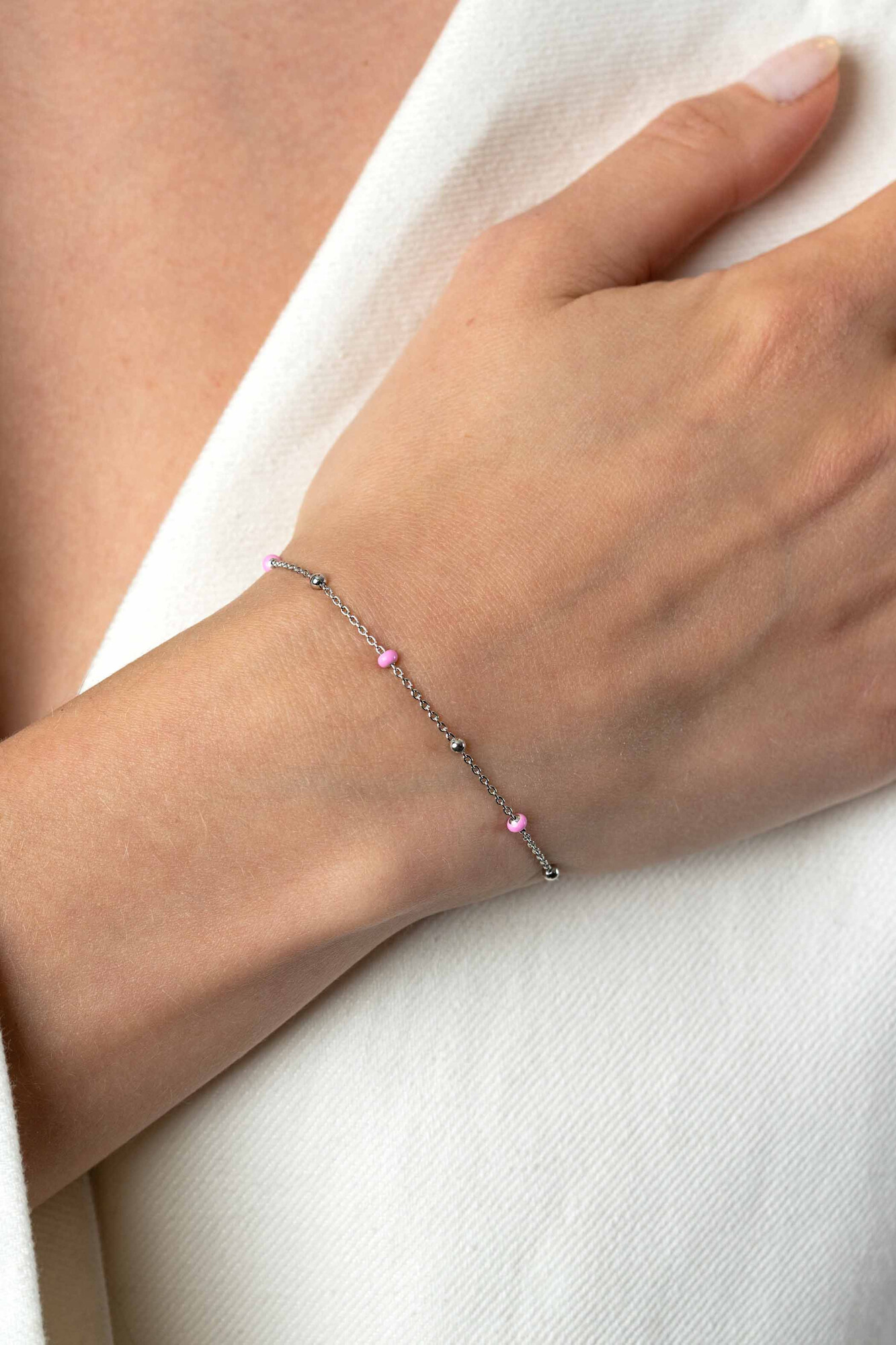 ZINZI zlv. armband met zlv.en roze bolletjes