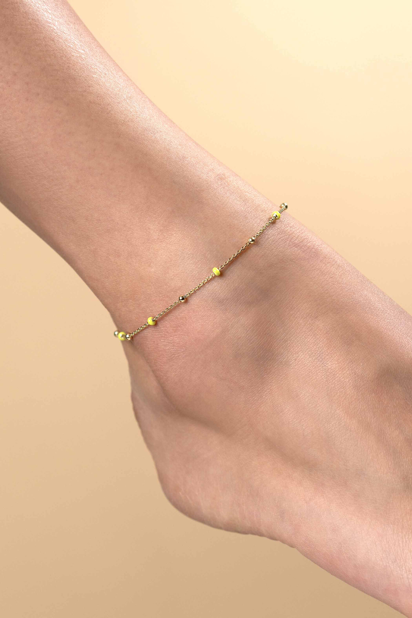 ZINZI zlv. enkelband gg.verguld met gele bolletjes