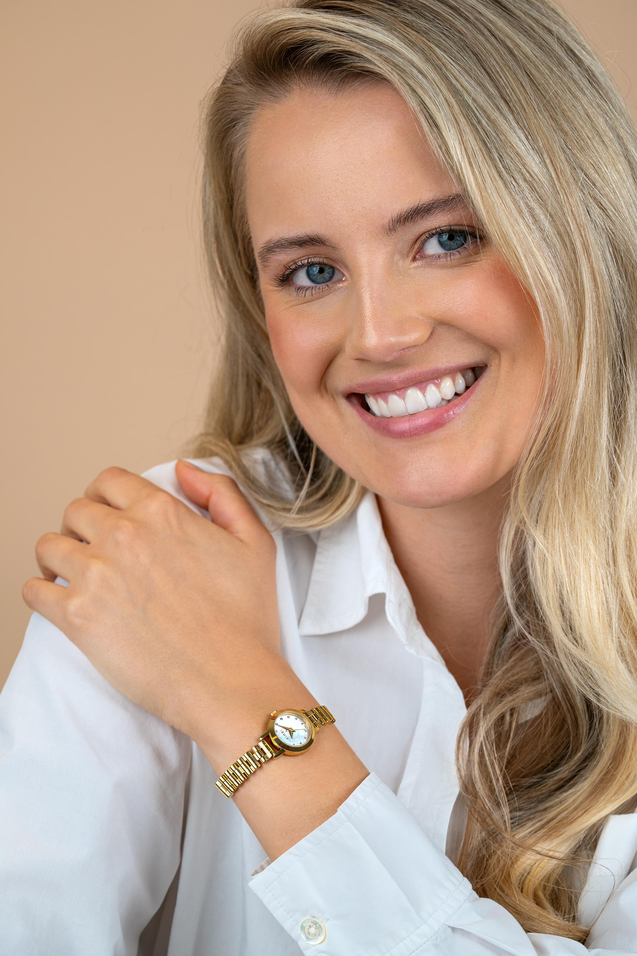 ZINZI Etoile Nuit Uhr 20 mm weißes Perlmutt-Zifferblatt Gelbgoldfarbige Stahlgehäuse und Armband ZIW3134