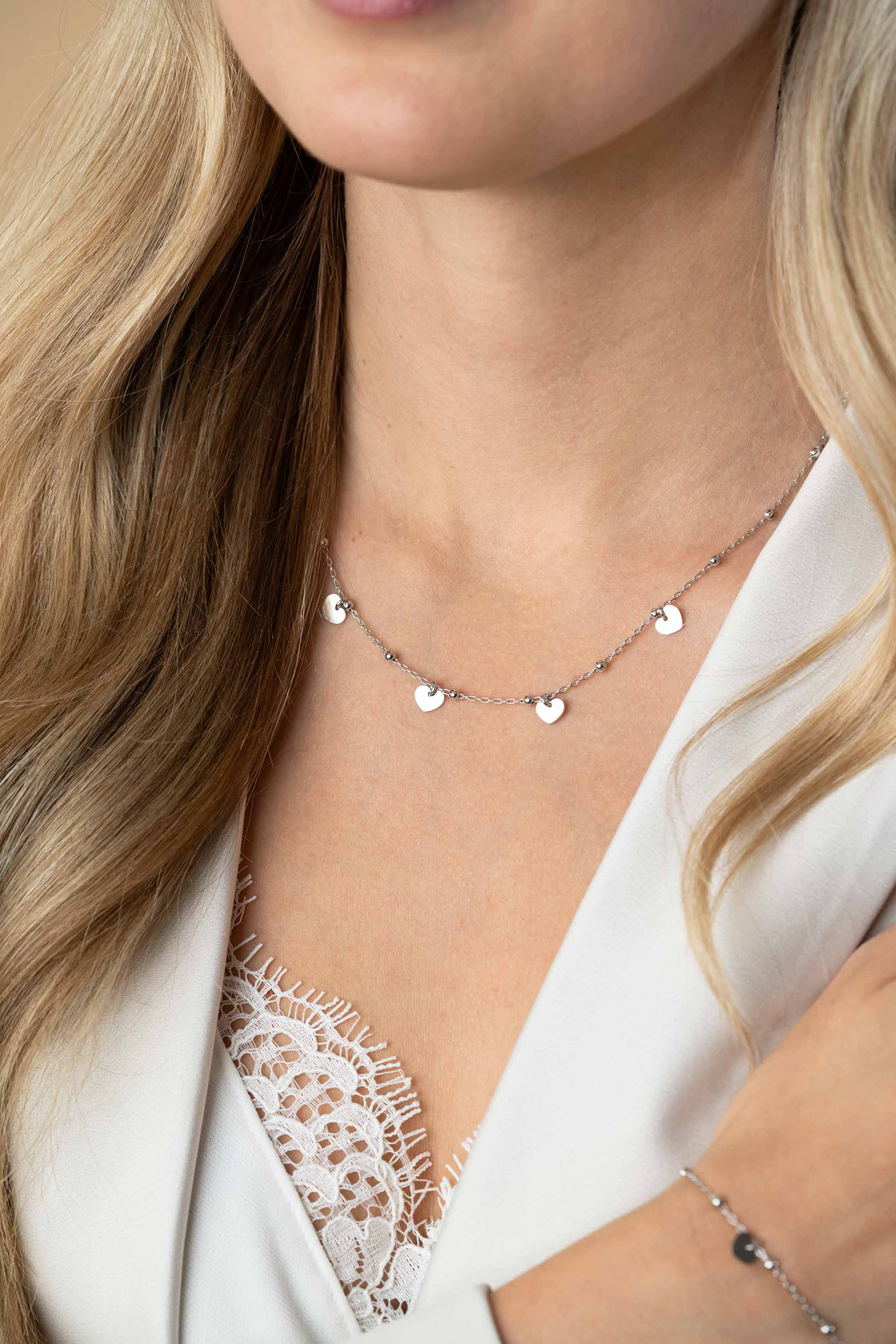 ZINZI zlv. collier fant. met hartjes eraan