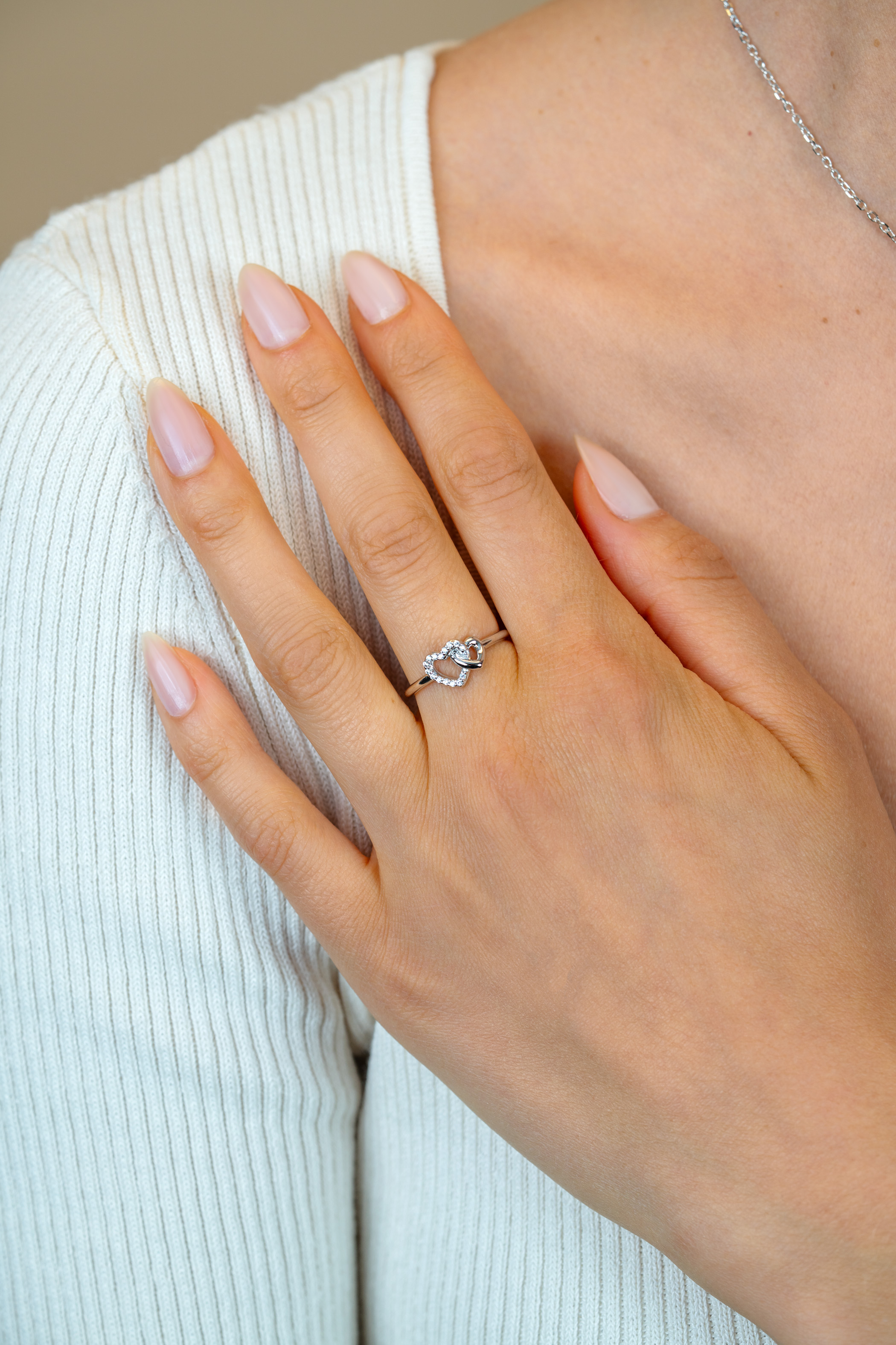 ZINZI zlv. ring 2 hartjes in elkaar 1x met zirc.mt.58