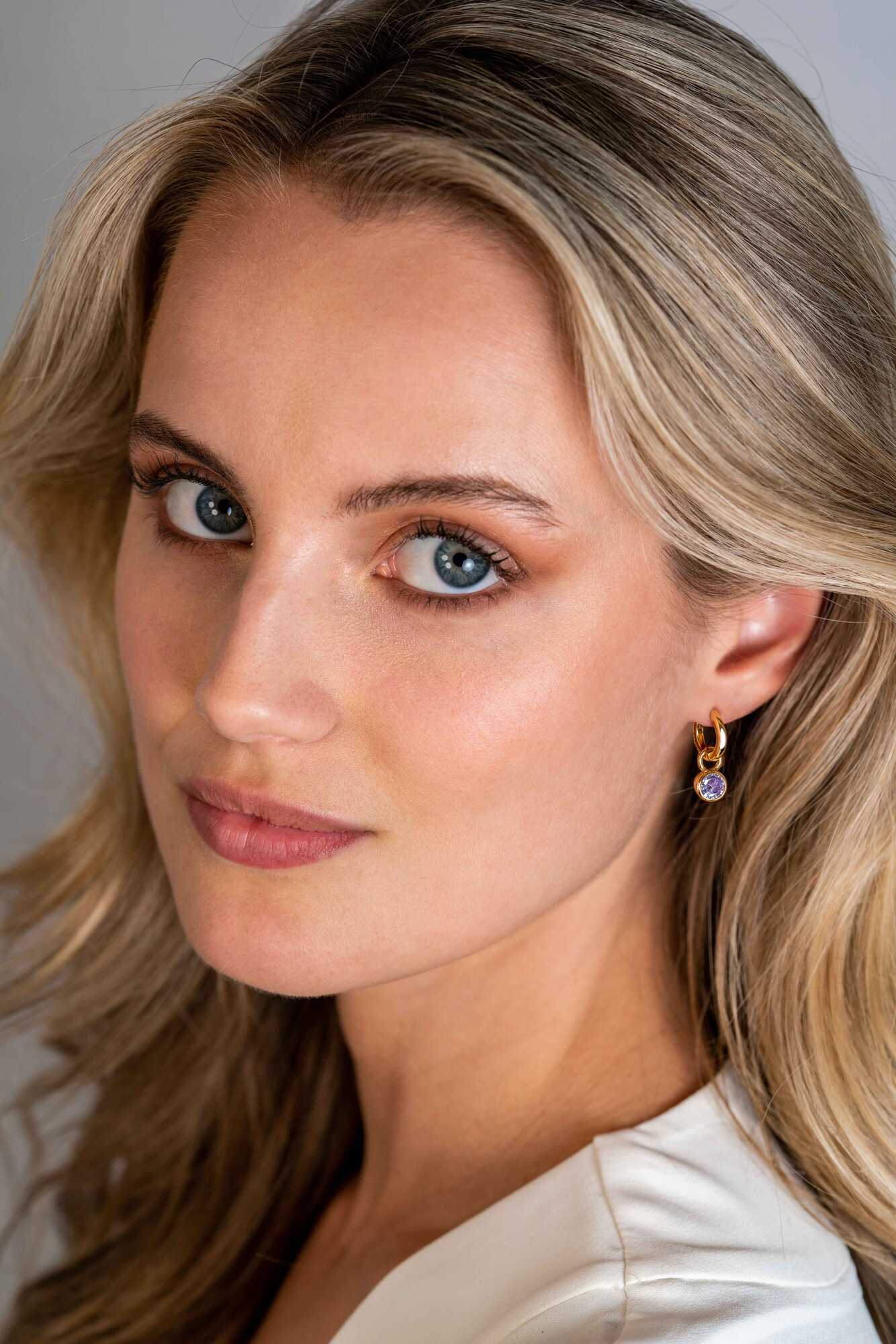 ZINZI zlv.oorb. gg.verg. birthstones licht amethist cz