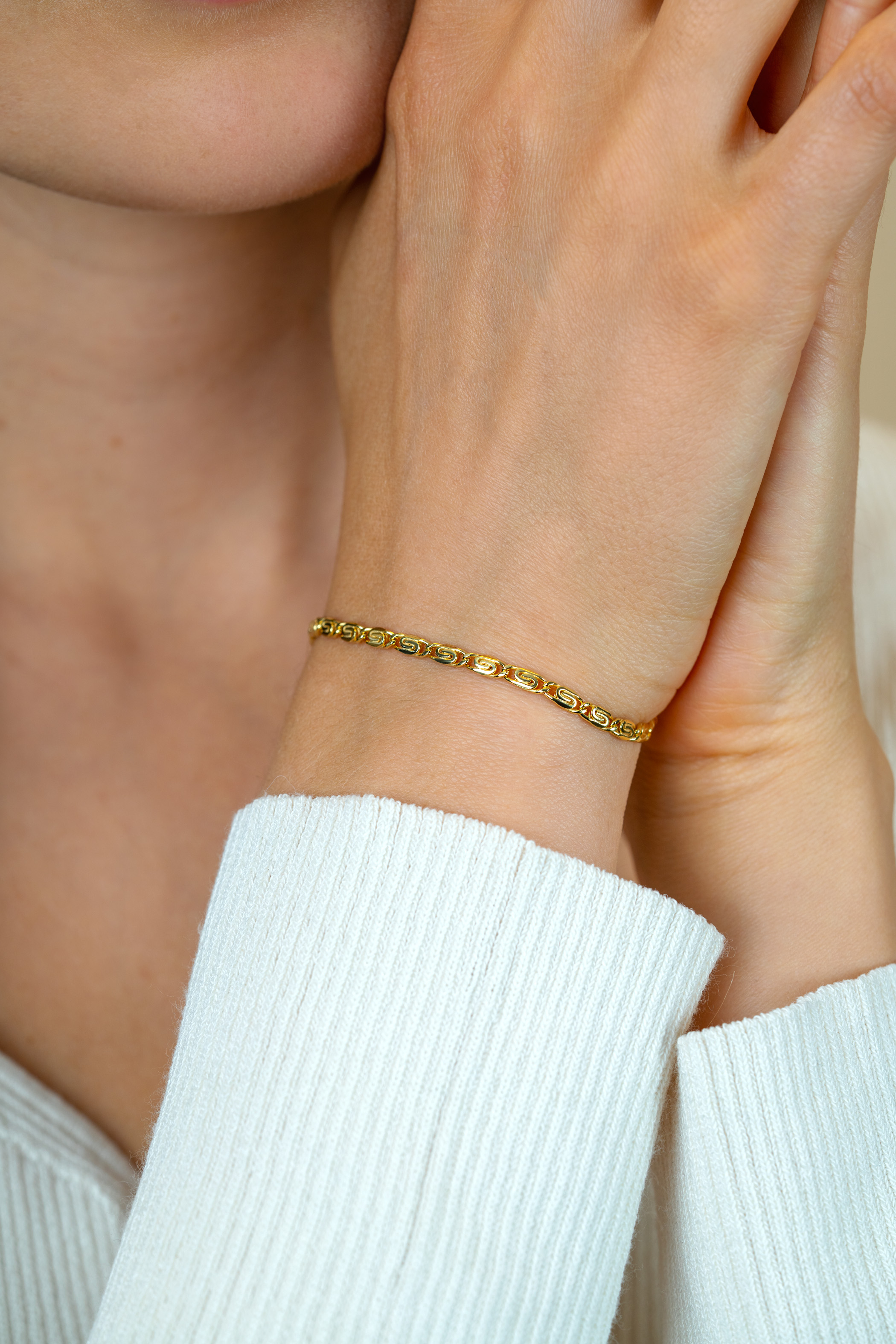 ZINZI zlv. armband gg.verg. scroll schakels 3mm