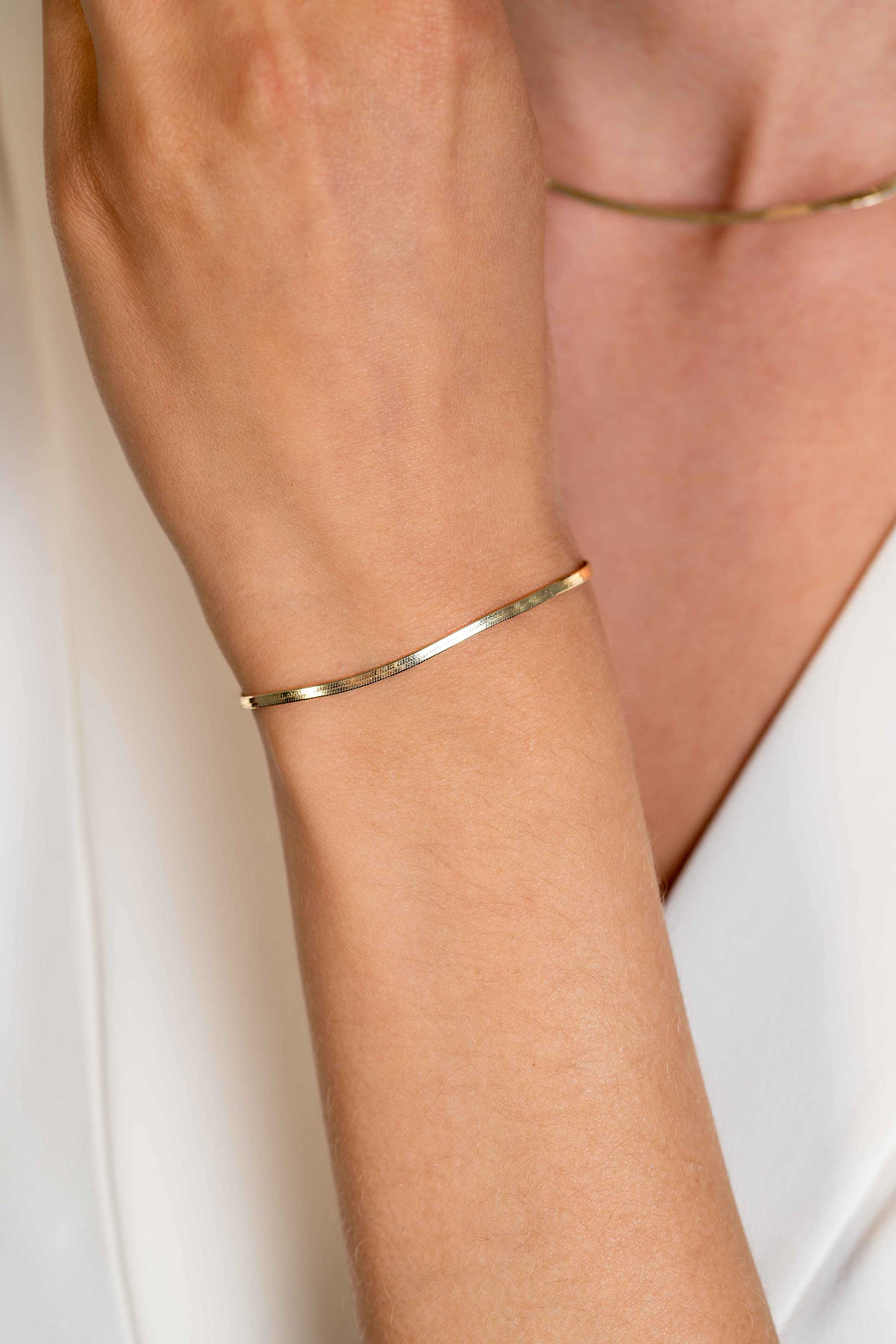 ZINZI zlv. armband geel verguld platte slang 2mm