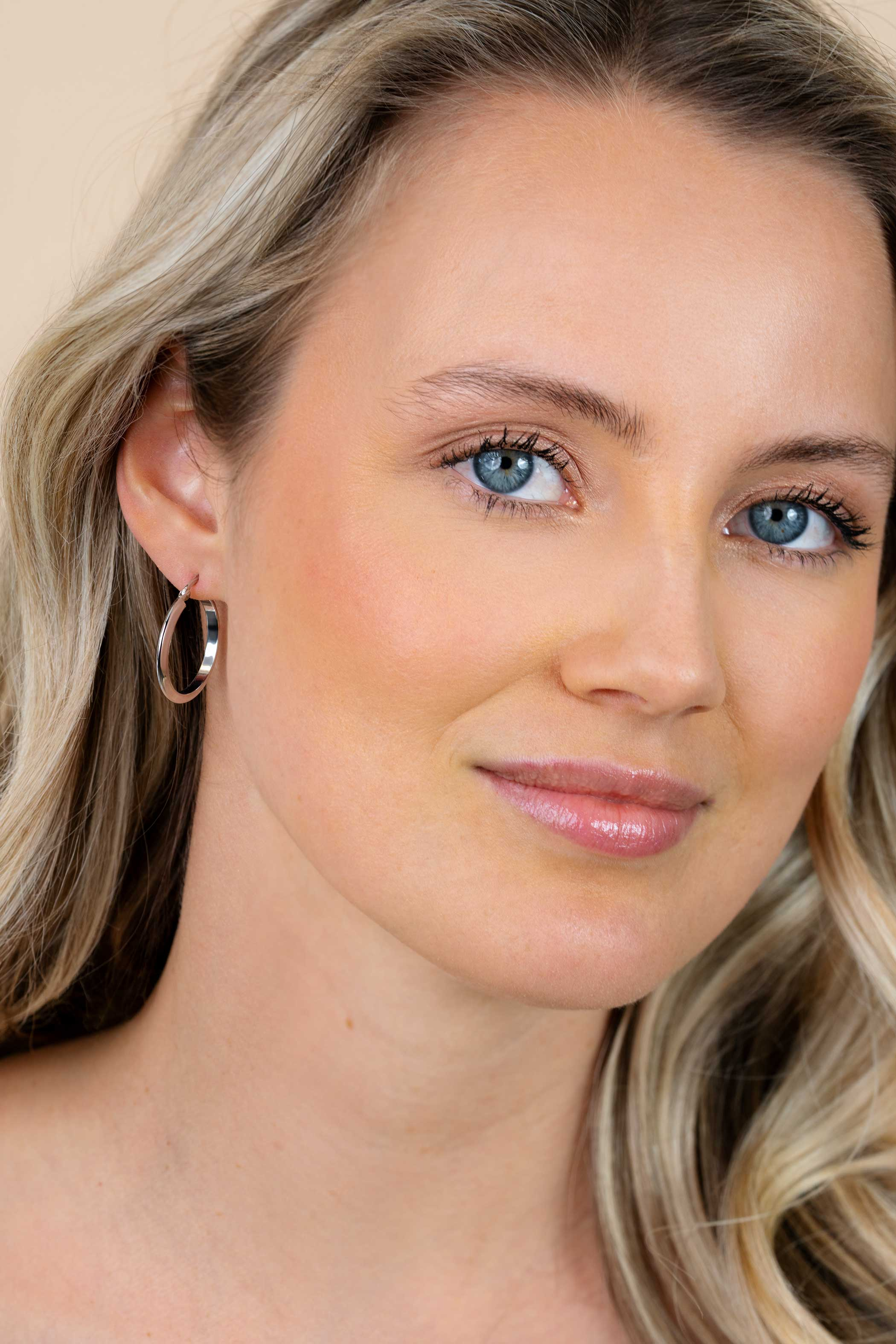 ZINZI zlv. oorringen rond driehoek buis