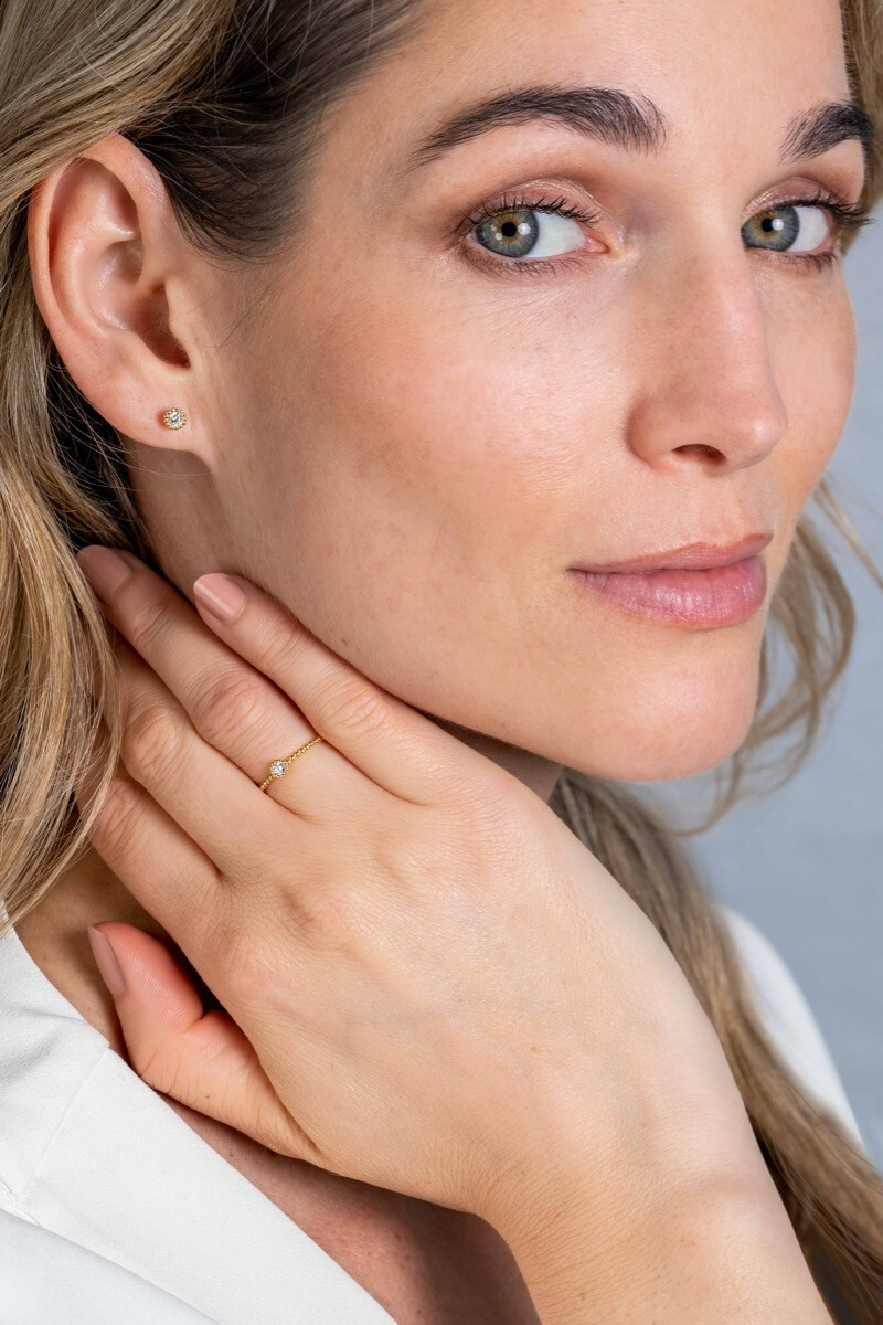 ZINZI Gold bolletjes ring met zirconia rond mt. 58