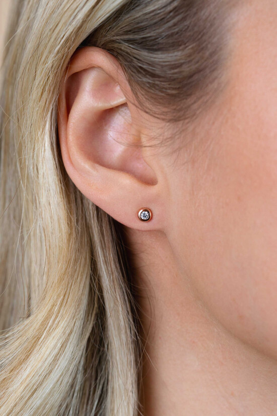 "Zinzi silberne Ohrstecker 14K rosé vergoldet rund 4mm weiß ZIO1177R"