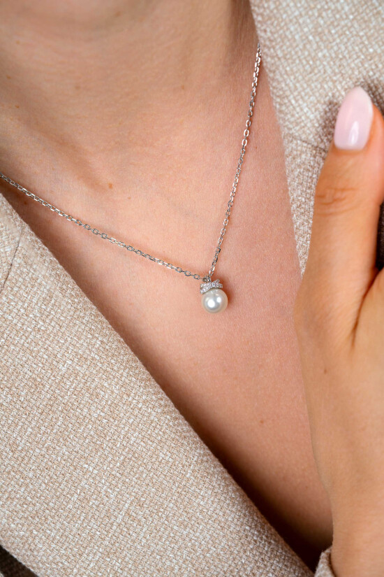 ZINZI zlv. collier met parel hanger en kruislings ziirc.